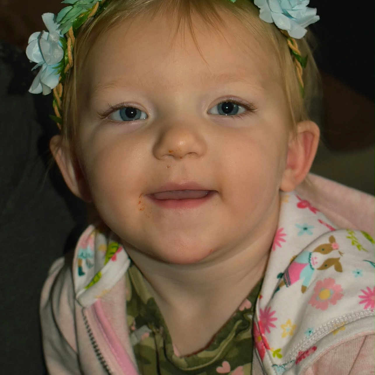 Novalynn Skye joined the competition — help win amazing prizes! baby, blue_eyes, child, closeup, clothing, cute, expression, face, fashion, flower_crown, happy, head, hoodie, indoor, jacket, person, portrait, smiling, toddler, young_child