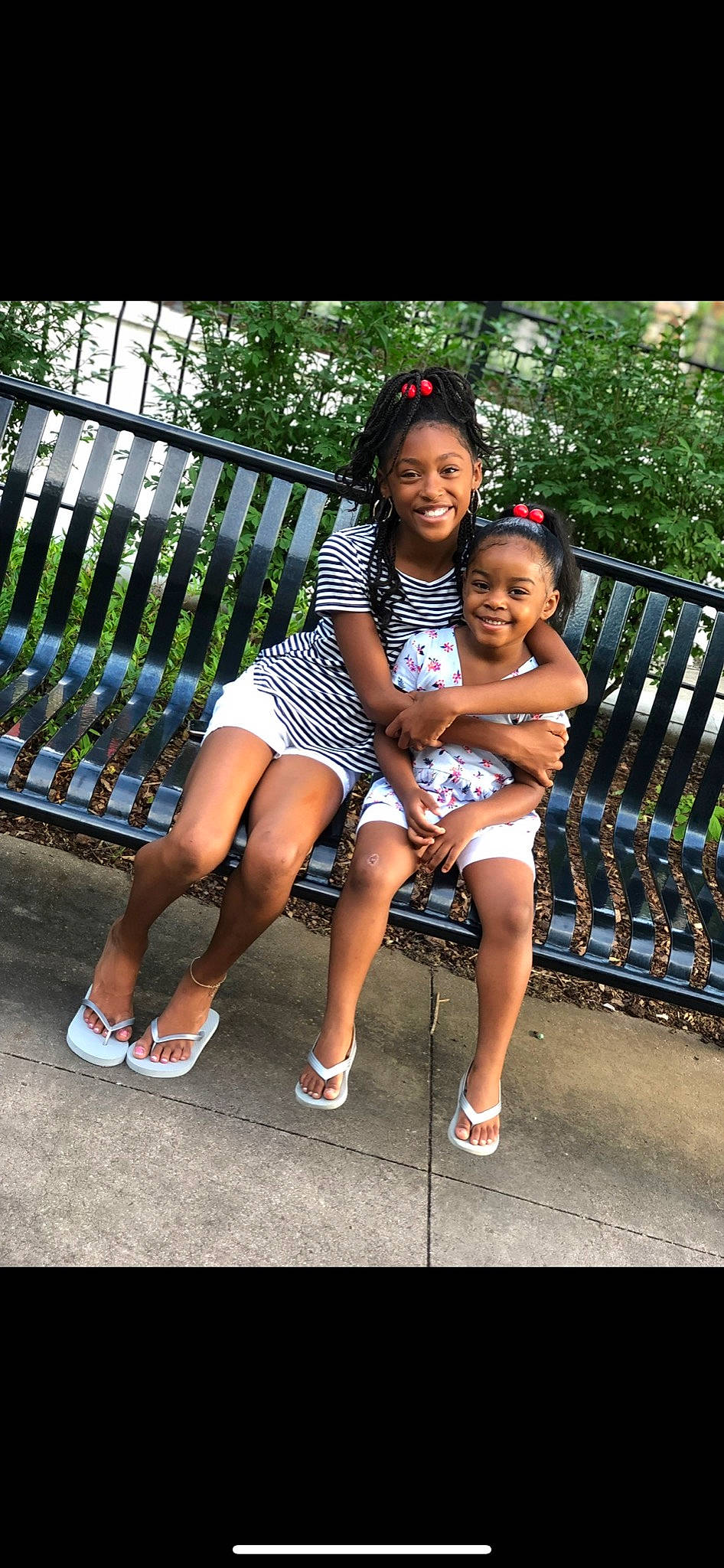 Kennia joined the competition — help win amazing prizes! black_hair, fence, flip_flops, footwear, fun, grass, happy, human_leg, joy, leg, leisure, people_in_nature, person, recreation, shoe, shorts, smile, sneakers, thigh, travel