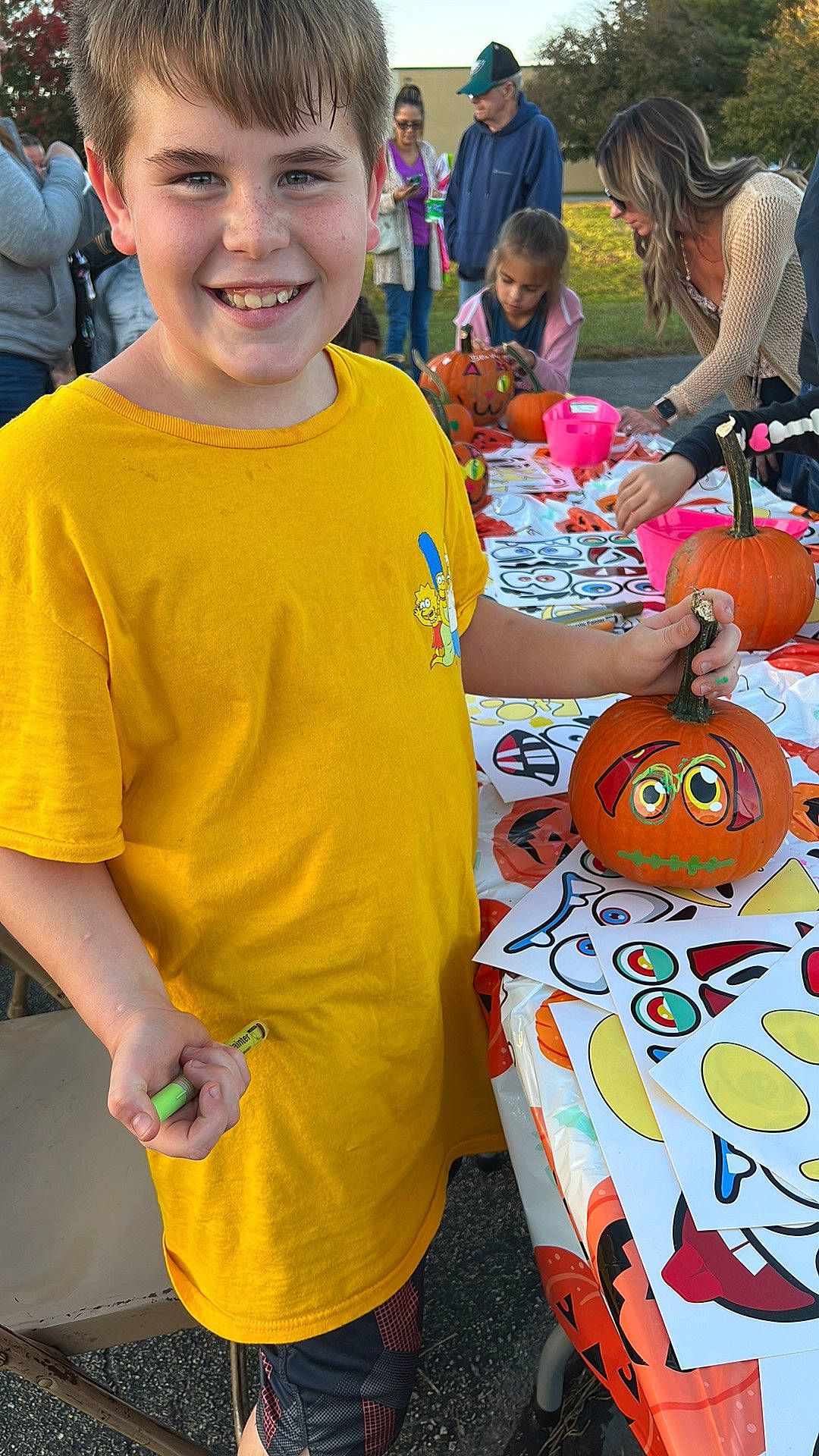 Dayton is registered to the contest to win money with this photo: art, artist, child, crowd, event, festival, fun, happy, hat, headwear, joy, leisure, people, person, public_event, recreation, shorts, sleeve, smile, t_shirt