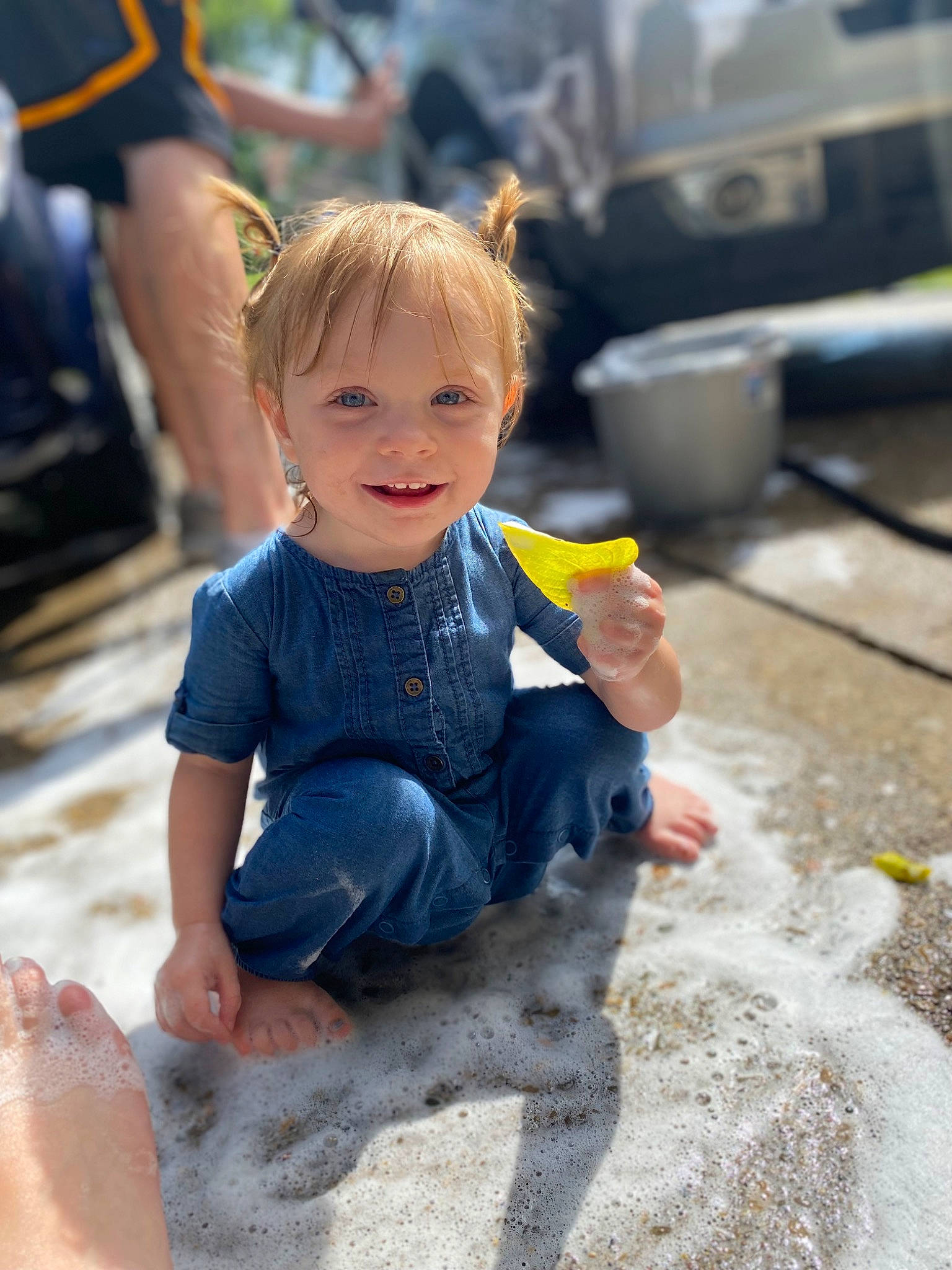 Kaleah joined the competition — help win amazing prizes! asphalt, barefoot, child, city, concrete, event, foot, fun, happy, human_leg, joy, leisure, person, recreation, sand, sitting, skin, smile, soil, t_shirt