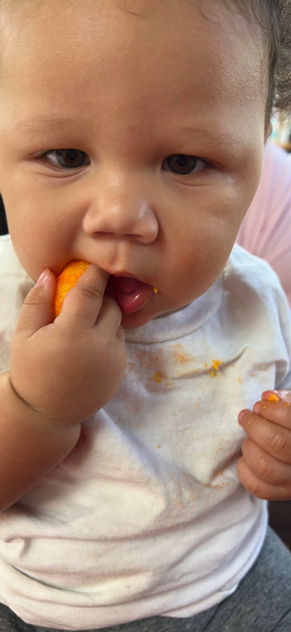 Jay is registered to the contest to win money with this photo: baby, baby_playing_with_food, baby_toddler_clothing, biting, cheek, child, eyelash, finger, food_craving, gesture, hand, iris, lip, mouth, nail, nose, person, skin, tableware, thumb