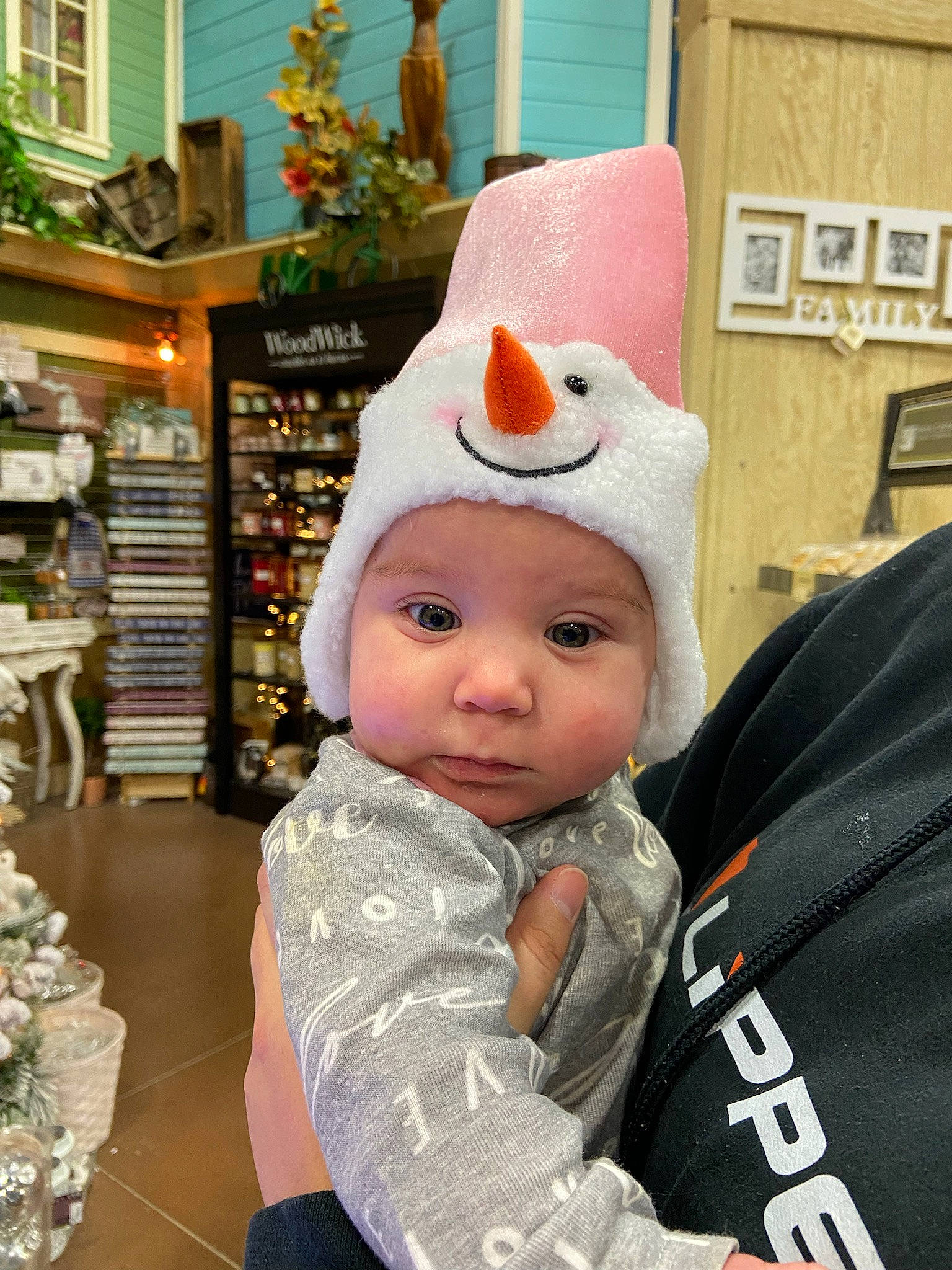 Arya is registered to the contest to win money with this photo: baby, baby_toddler_clothing, baseball_cap, beanie, cap, child, costume, costume_hat, event, fashion_accessory, fun, fur, headgear, headwear, jacket, knit_cap, person, personal_protective_equipment, retail, shelf