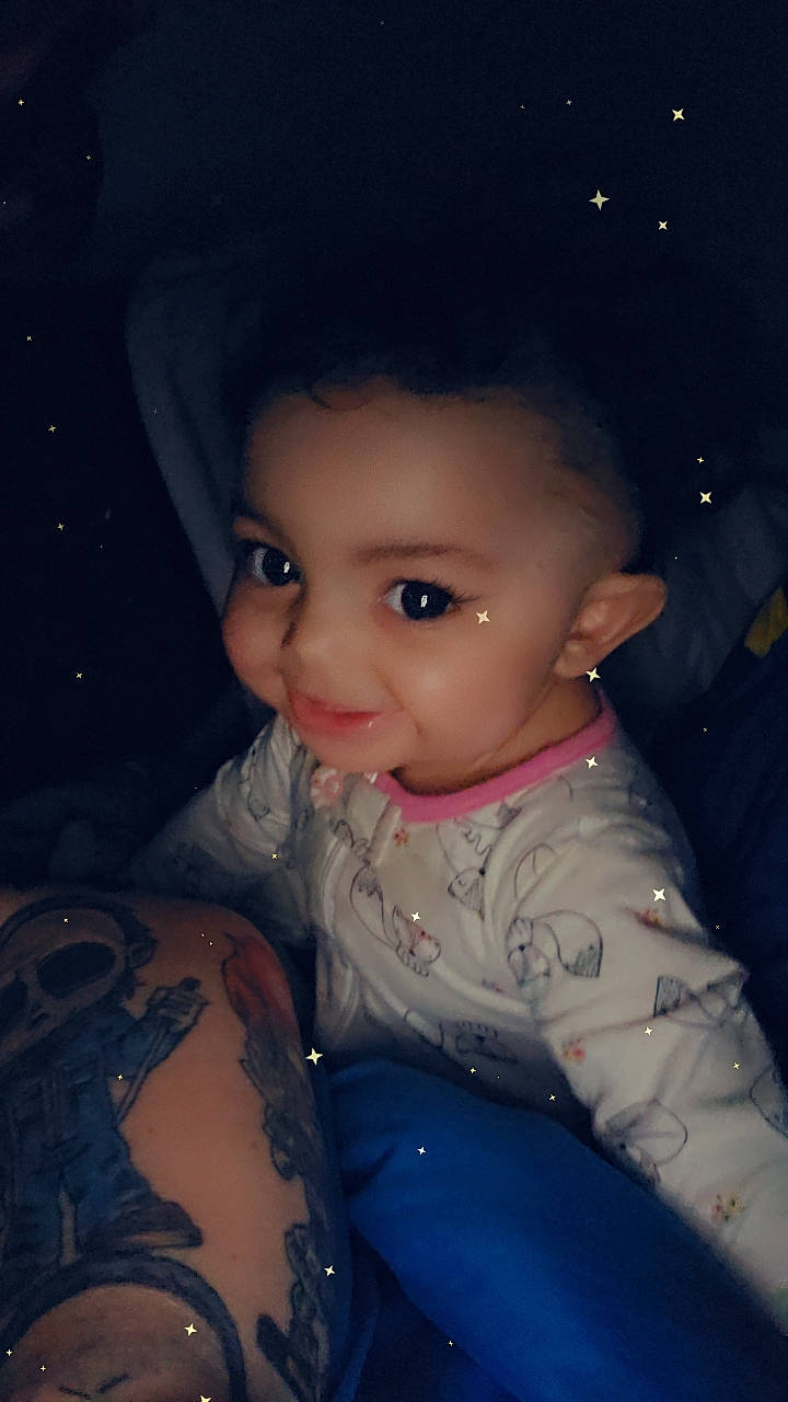 Madilynne is registered to the contest to win money with this photo: black_hair, cheek, chin, cool, doll, electric_blue, eye, eyelash, facial_expression, flash_photography, forehead, hair, hat, head, iris, lip, nose, person, skin, sleeve