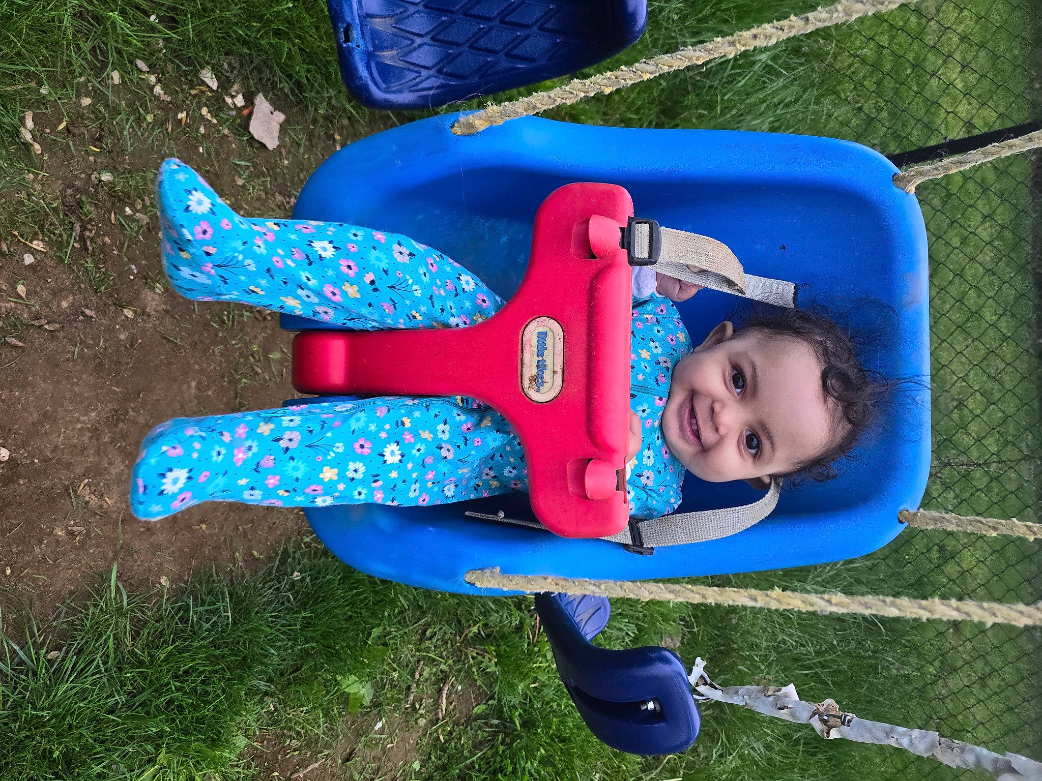 Madilynne is registered to the contest to win money with this photo: baby_toddler_clothing, blue, child, city, electric_blue, fun, grass, happy, hat, joy, leisure, outdoor_play_equipment, people_in_nature, person, plant, play, playground, recreation, smile, toddler