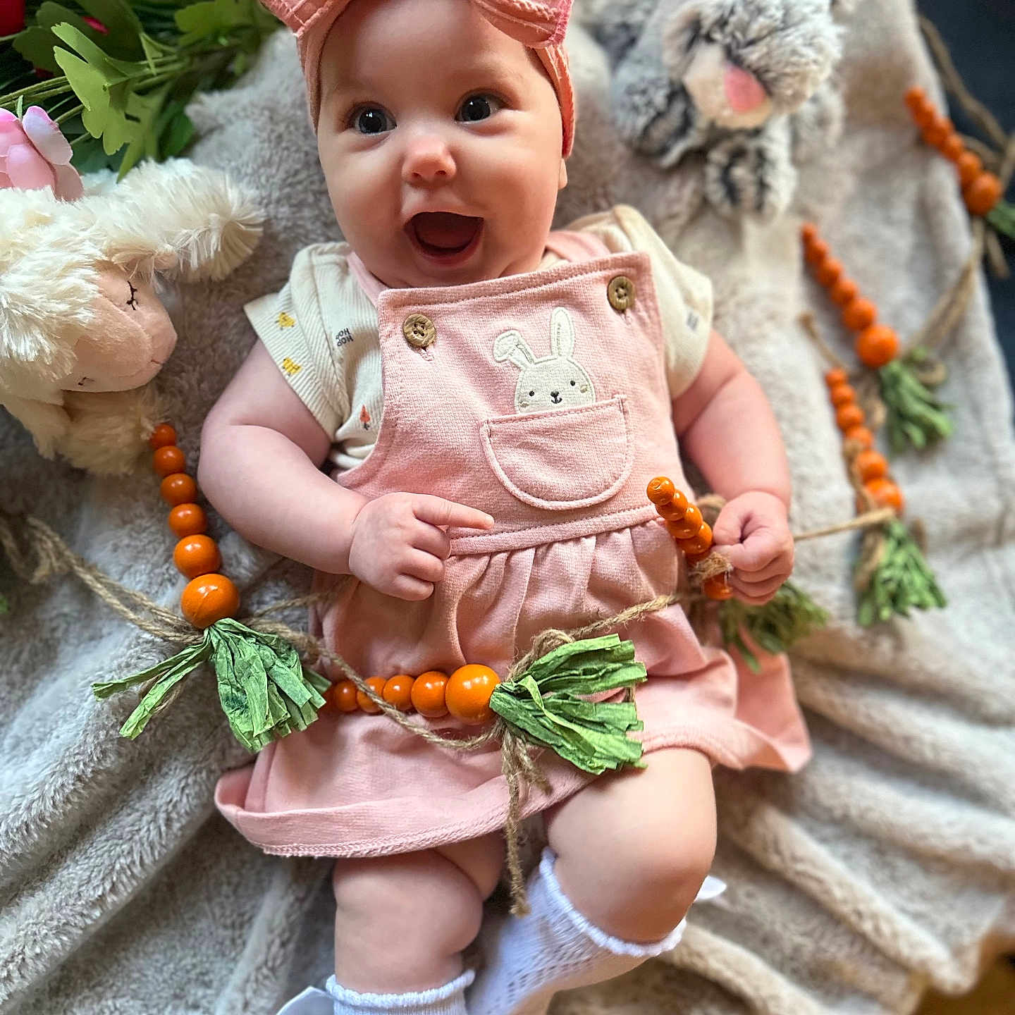 Lillith is registered to the contest to win money with this photo: accessories, baby, babylaughing, clothing, costume, doll, face, happy, head, jewelry, necklace, person, photography, portrait, sitting, toy, yawning