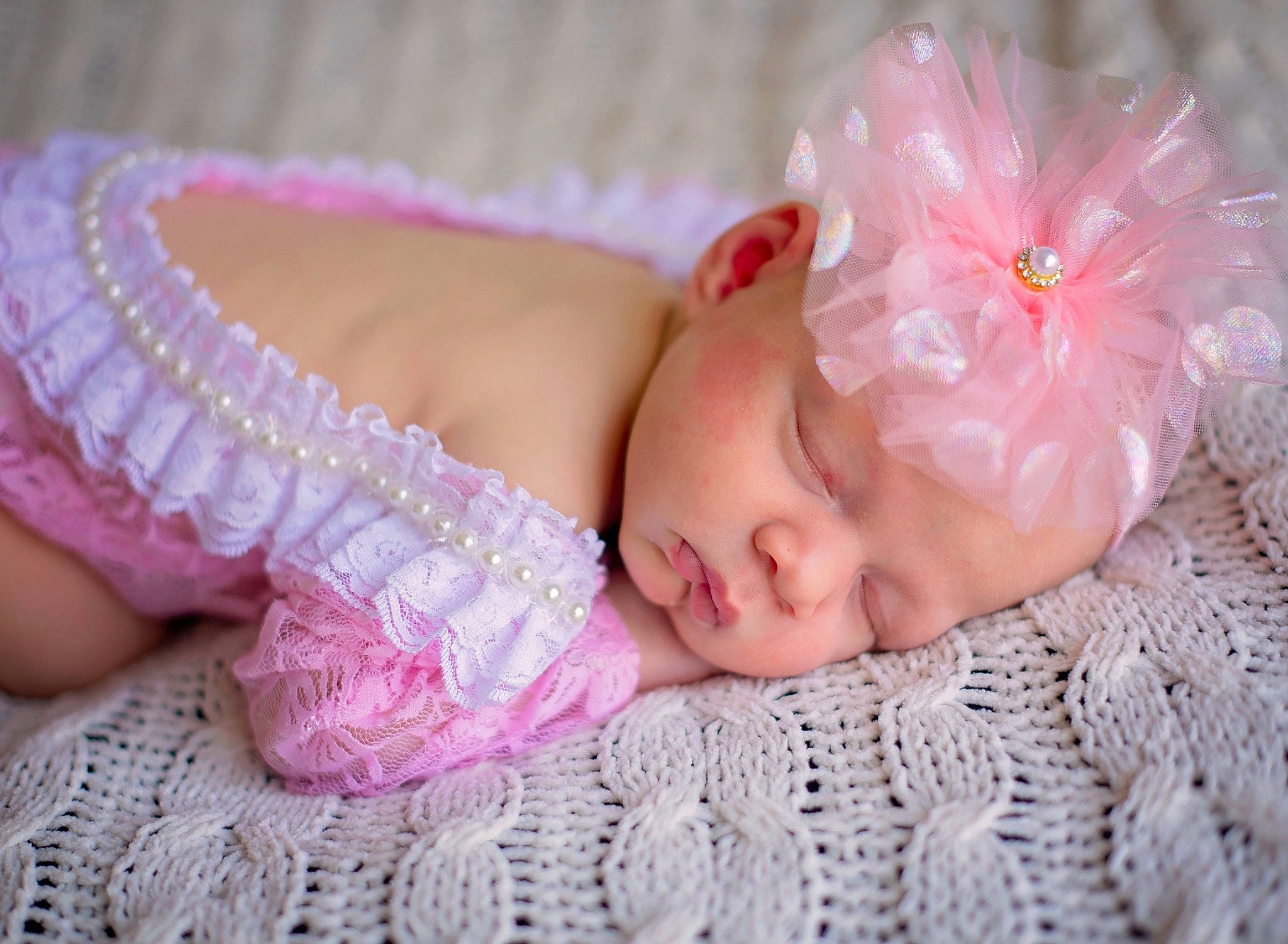 Annalynn joined the competition — help win amazing prizes! baby, baby_sleeping, baby_toddler_clothing, child, comfort, dress, embellishment, eyelash, fashion_accessory, hair_accessory, headband, headgear, headpiece, linens, magenta, pattern, person, pink, skin, textile