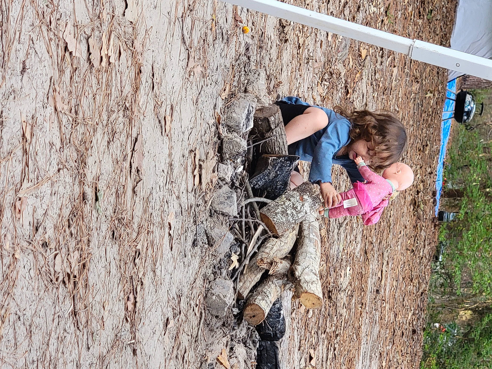 Josephine joined the competition — help win amazing prizes! adventure, child, forest, fun, grass, happy, leisure, people_in_nature, person, plant, recreation, rock, rope, sitting, soil, t_shirt, toddler, tree, trunk, twig