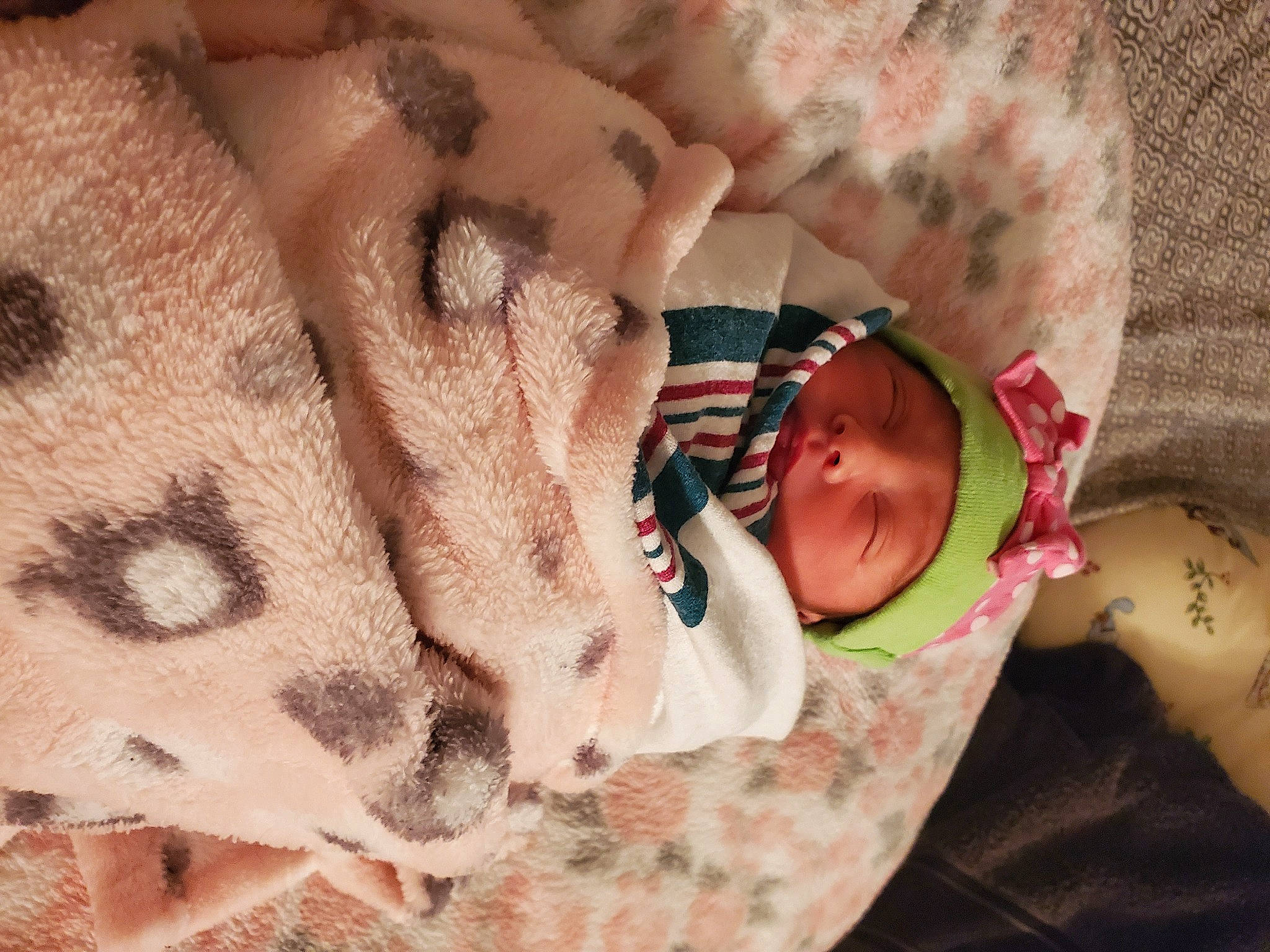 Josephine is registered to the contest to win money with this photo: baby, baby_sleeping, baby_toddler_clothing, child, comfort, eye, fawn, felidae, glasses, hand, head, headwear, linens, mammal, nail, pattern, person, product, skin, sunglasses