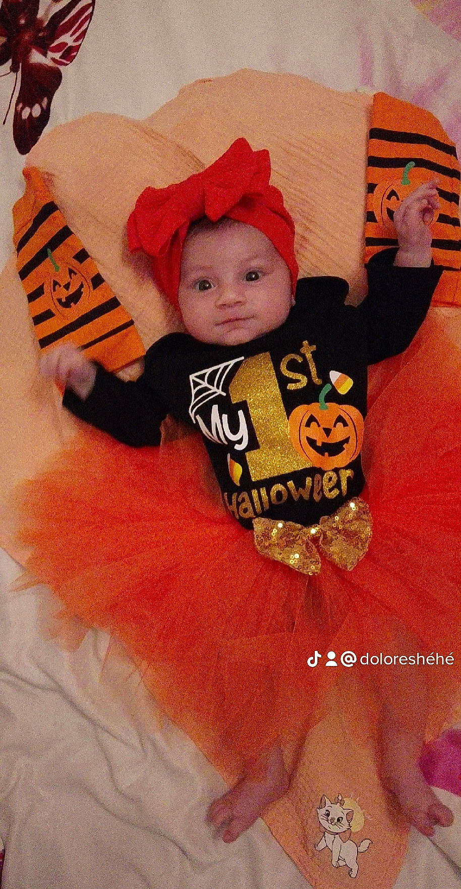 Françoise participe au concours pour gagner de l'argent avec cette photo : baby, baby_products, baby_toddler_clothing, child, costume, costume_hat, event, fashion_accessory, font, fun, fur, happy, hat, headgear, headwear, linens, orange, person, pink, sleeve
