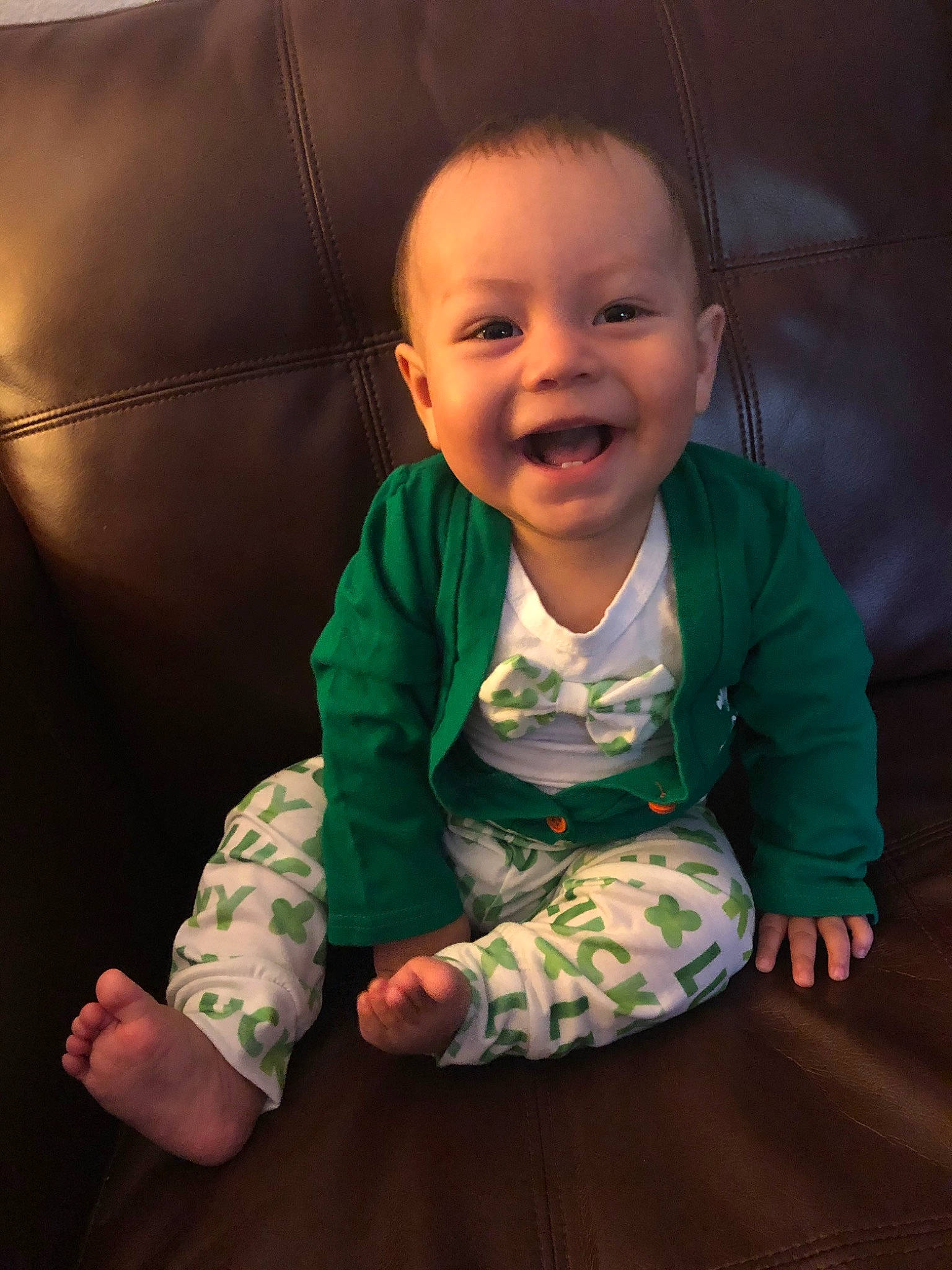Cesar is registered to the contest to win money with this photo: baby, cheek, child, chin, eye, face, facial_expression, fun, green, happy, head, iris, joy, laugh, lip, mouth, person, sitting, skin, sleeve