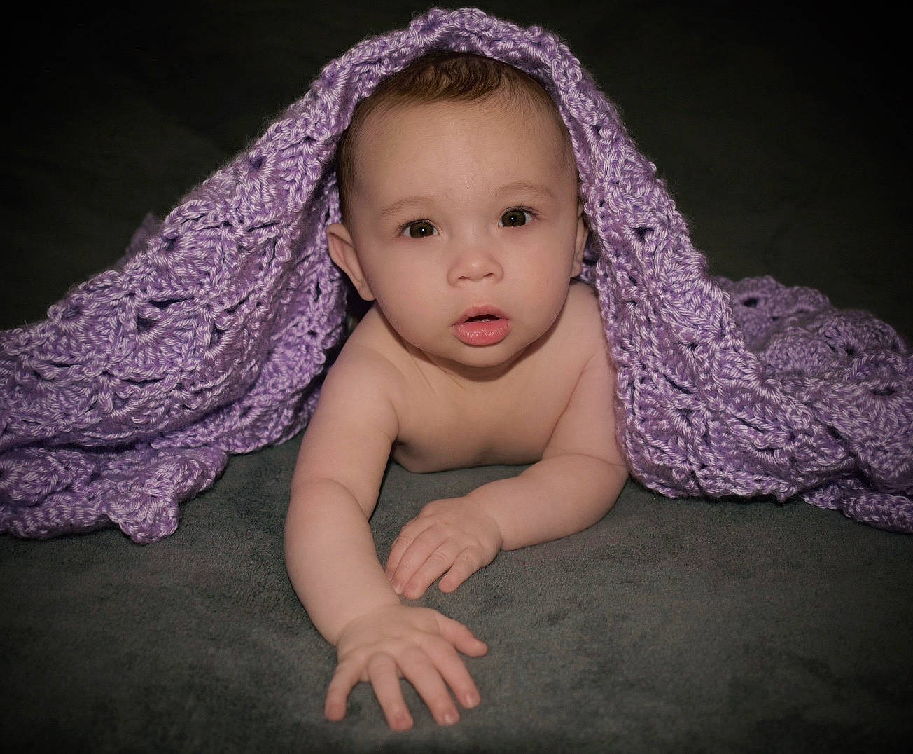 Karra is registered to the contest to win money with this photo: baby, beauty, cheek, child, child_model, crochet, eye, face, head, headgear, iris, lip, nose, person, photograph, photography, pink, portrait_photography, purple, skin