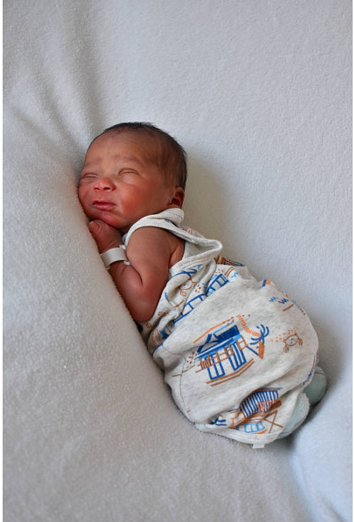 Jaycee joined the competition — help win amazing prizes! baby, baby_products, baby_safety, baby_sleeping, baby_toddler_clothing, bedding, bedtime, child, comfort, infant_bed, linens, pattern, person, portrait_photography, room, sitting, sleep, sleeve, t_shirt, textile