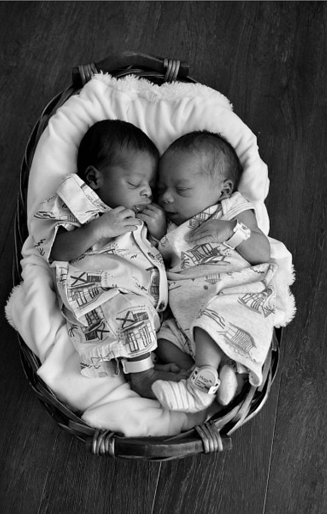 Jaycee Ja'Siah is registered to the contest to win money with this photo: abdomen, baby, baby_toddler_clothing, cheek, child, comfort, eye, flash_photography, fun, gesture, happy, iris, monochrome, monochrome_photography, person, portrait_photography, room, sitting, skin, sleeve