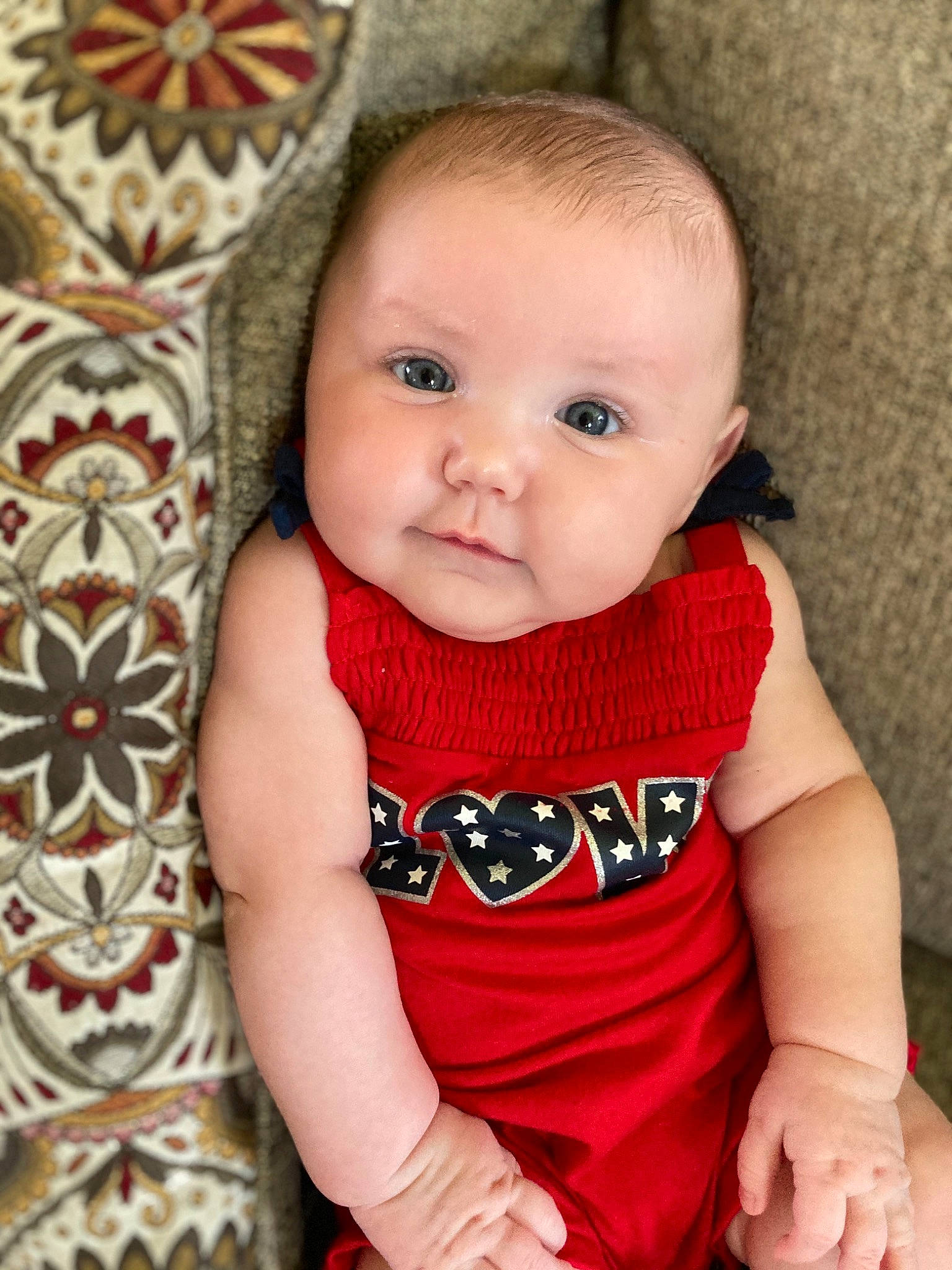 Rachel joined the competition — help win amazing prizes! baby, baby_toddler_clothing, cheek, child, dress, eye, face, head, iris, lip, nose, person, red, sitting, skin, smile, toddler