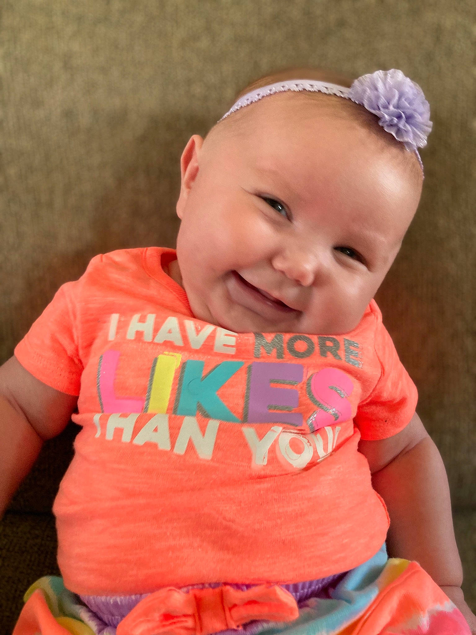 Rachel joined the competition — help win amazing prizes! baby, baby_products, baby_toddler_clothing, cheek, child, fashion_accessory, hair_accessory, headband, headgear, joy, orange, person, pink, product, skin, toddler