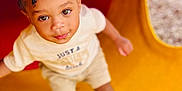 Kynd joined the competition — help win amazing prizes! toddler, child, playground, yellow, red, tunnel, braids, hair, curious, outdoor, shoes, shorts, tshirt, smiling, happy, person, play, fun, young, cute