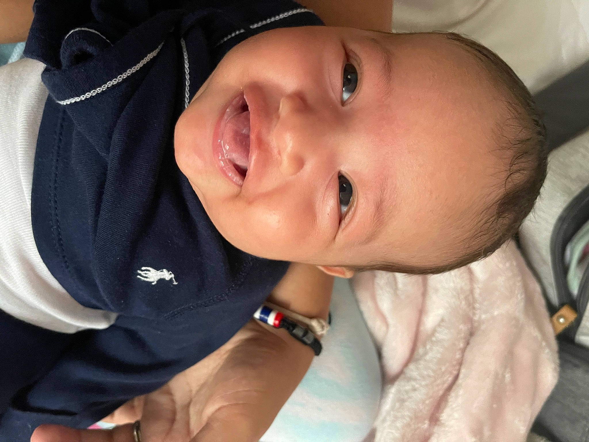 Analeigh is registered to the contest to win money with this photo: baby, baby_toddler_clothing, cheek, chin, comfort, eye, eyebrow, eyelash, face, finger, gesture, happy, human_body, iris, lip, mouth, neck, nose, person, skin