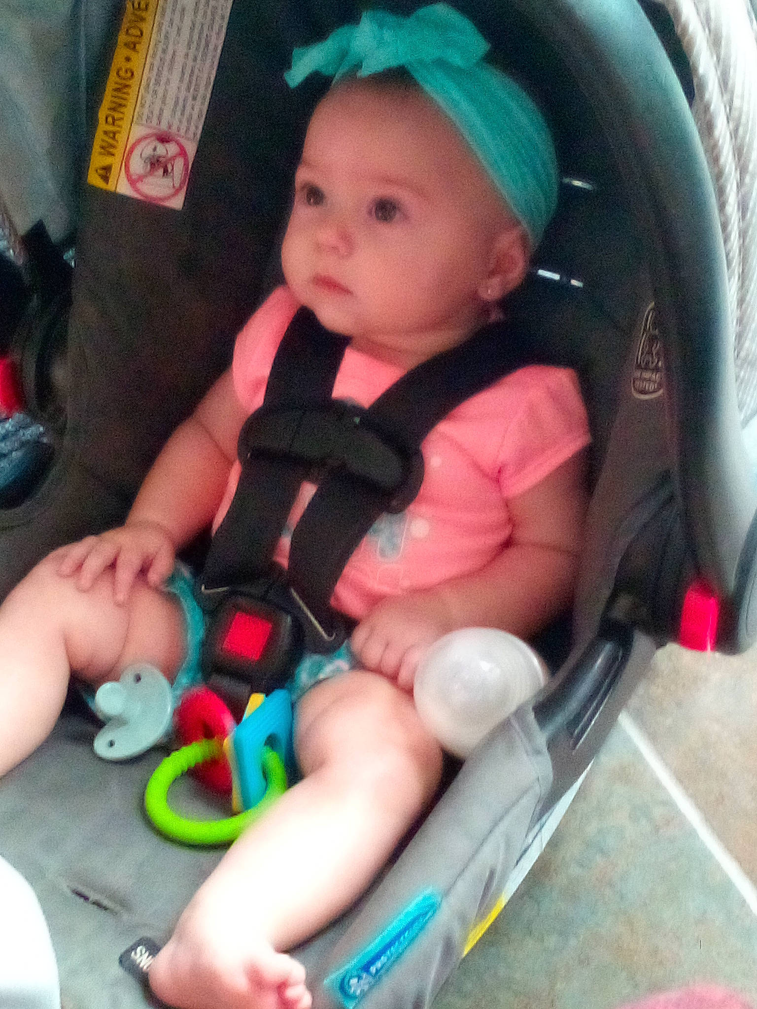 Rilynn is registered to the contest to win money with this photo: baby, baby_carriage, baby_safety, baby_toddler_clothing, car_seat, cheek, comfort, eye, finger, green, hand, head, human_body, lap, mouth, person, photograph, product, skin, thumb