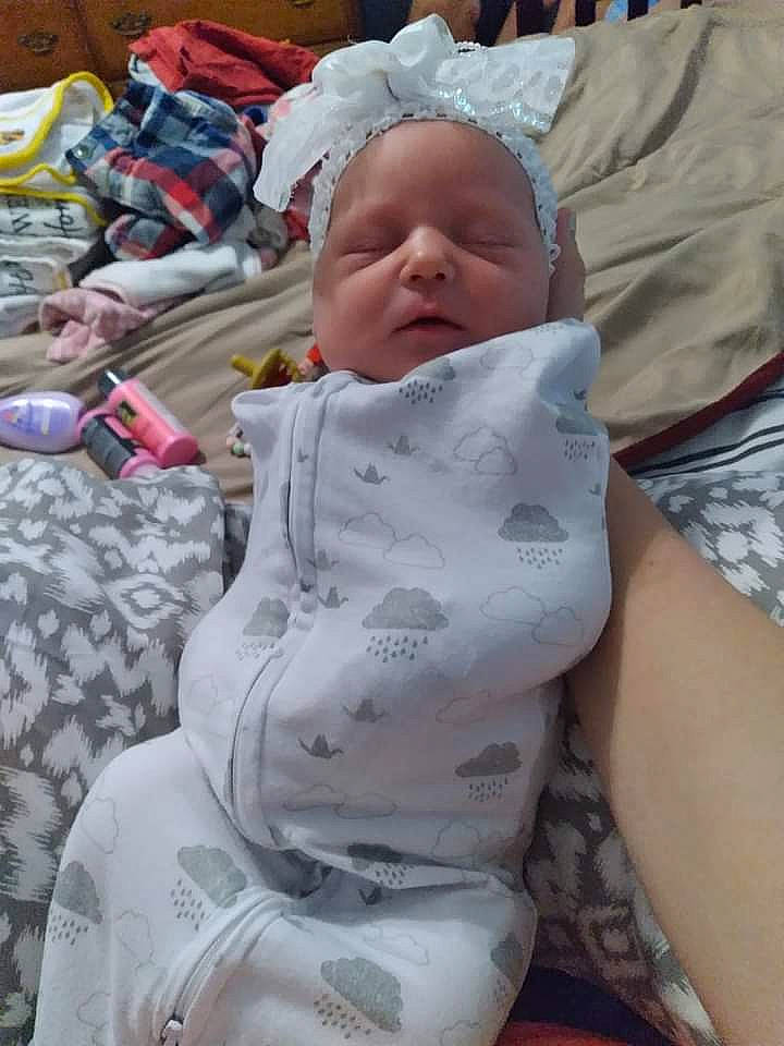 Aaliyah joined the competition — help win amazing prizes! baby, baby_carriage, baby_products, baby_toddler_clothing, cheek, child, comfort, fun, grass, hat, head, linens, person, sitting, skin, sleeve, toddler