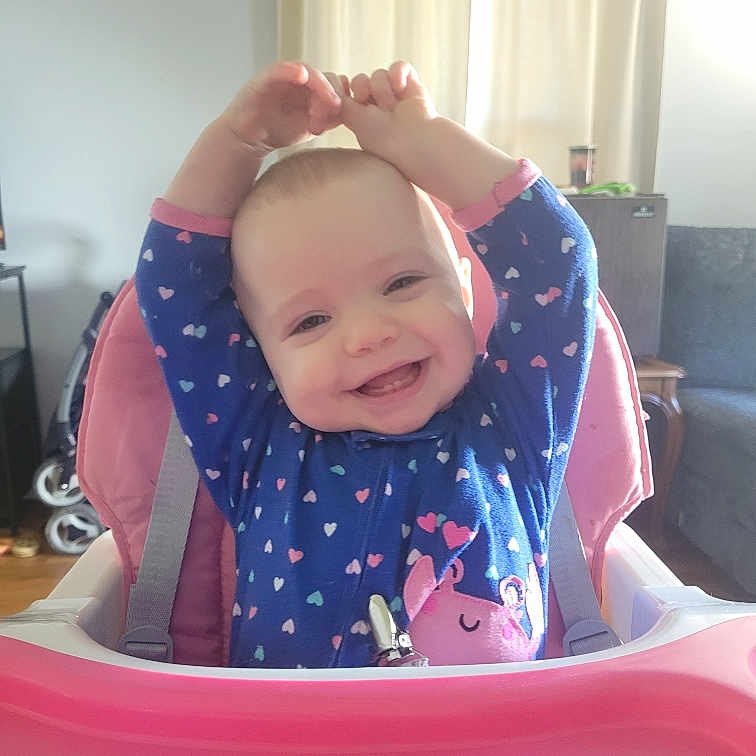 Neave joined the competition — help win amazing prizes! baby, chair, clothing, crib, cushion, cutlery, face, furniture, happy, head, homedecor, indoors, infantbed, laughing, person, photography, portrait, smile, spoon, t_shirt