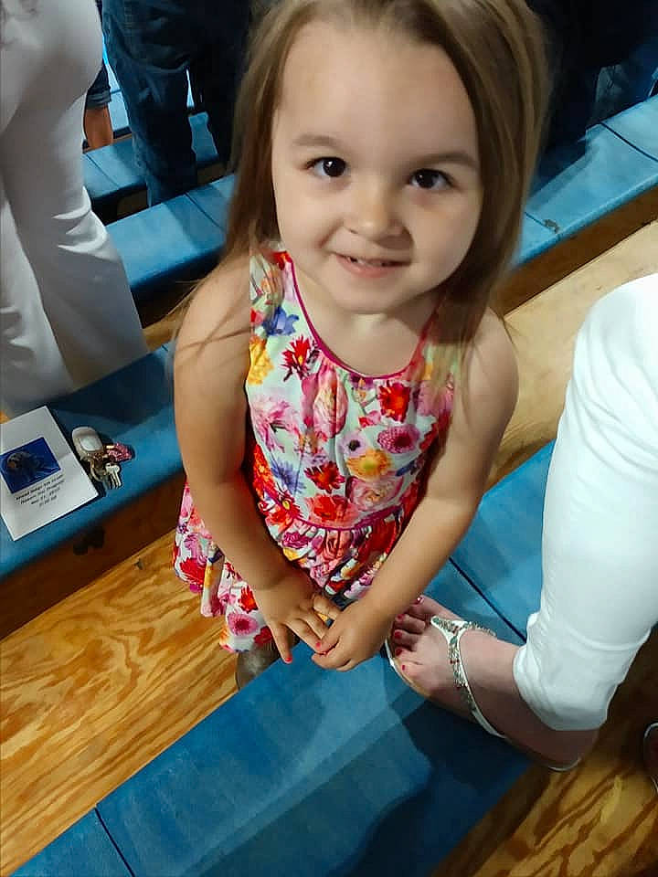 Allyson is registered to the contest to win money with this photo: arm, child, face, fun, joy, person, play, sitting, smile, t_shirt, toddler, vacation