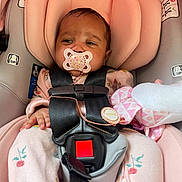 Aveilee is registered to the contest to win money with this photo: accessories, baby, belt, car, car_interior, carseat, crib, cushion, face, furniture, head, homedecor, infantbed, person, photography, portrait, sleeping, sunglasses, transportation, vehicle