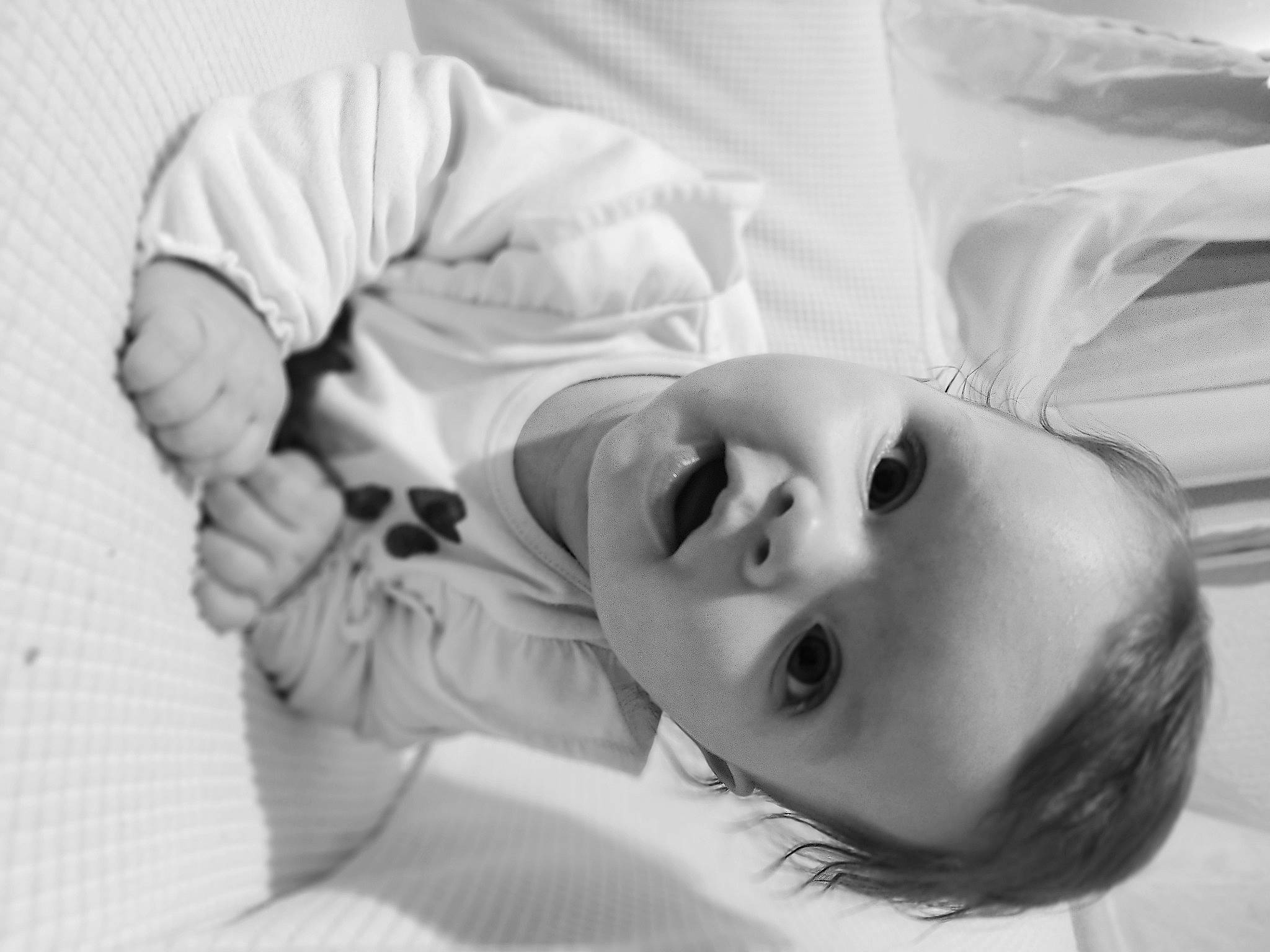 Louane participe au concours pour gagner de l'argent avec cette photo : baby, baby_sleeping, baby_toddler_clothing, child, comfort, eyelash, face, flash_photography, gesture, happy, linens, monochrome, monochrome_photography, nose, person, portrait, portrait_photography, sleeve, smile, textile