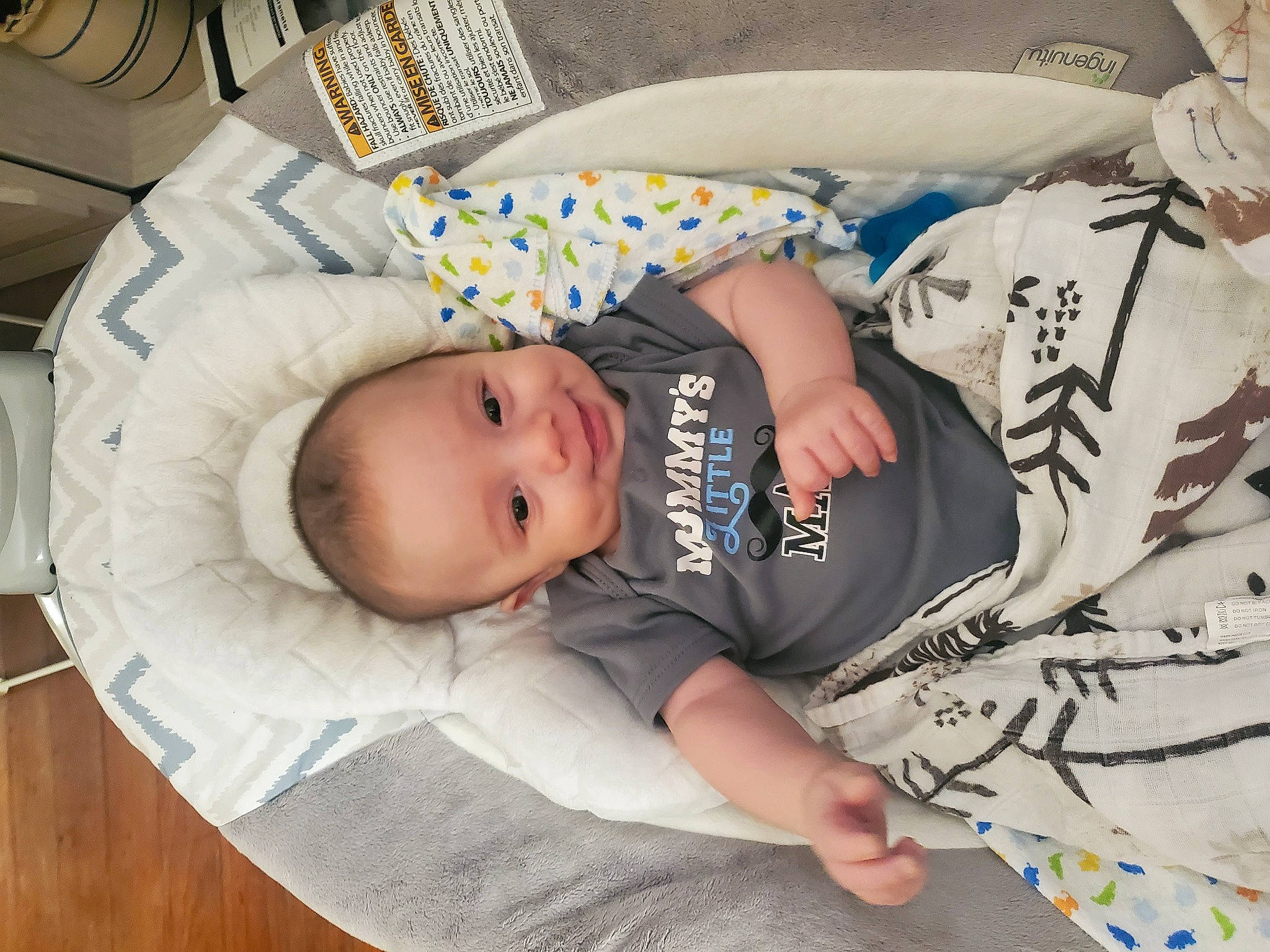 Ryden joined the competition — help win amazing prizes! baby, baby_products, baby_toddler_clothing, bedtime, child, comfort, hardwood, hat, linens, nap, pattern, person, room, sitting, smile, t_shirt, toddler, wood