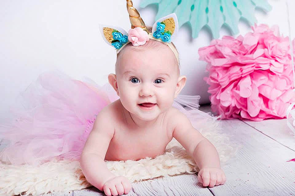 Calie participe au concours pour gagner de l'argent avec cette photo : baby, baby_bloomers, baby_toddler_clothing, ballet_tutu, child, child_model, costume, costume_accessory, crown, ear, fashion_accessory, hair_accessory, headband, headgear, headpiece, person, photography, pink, product, smile