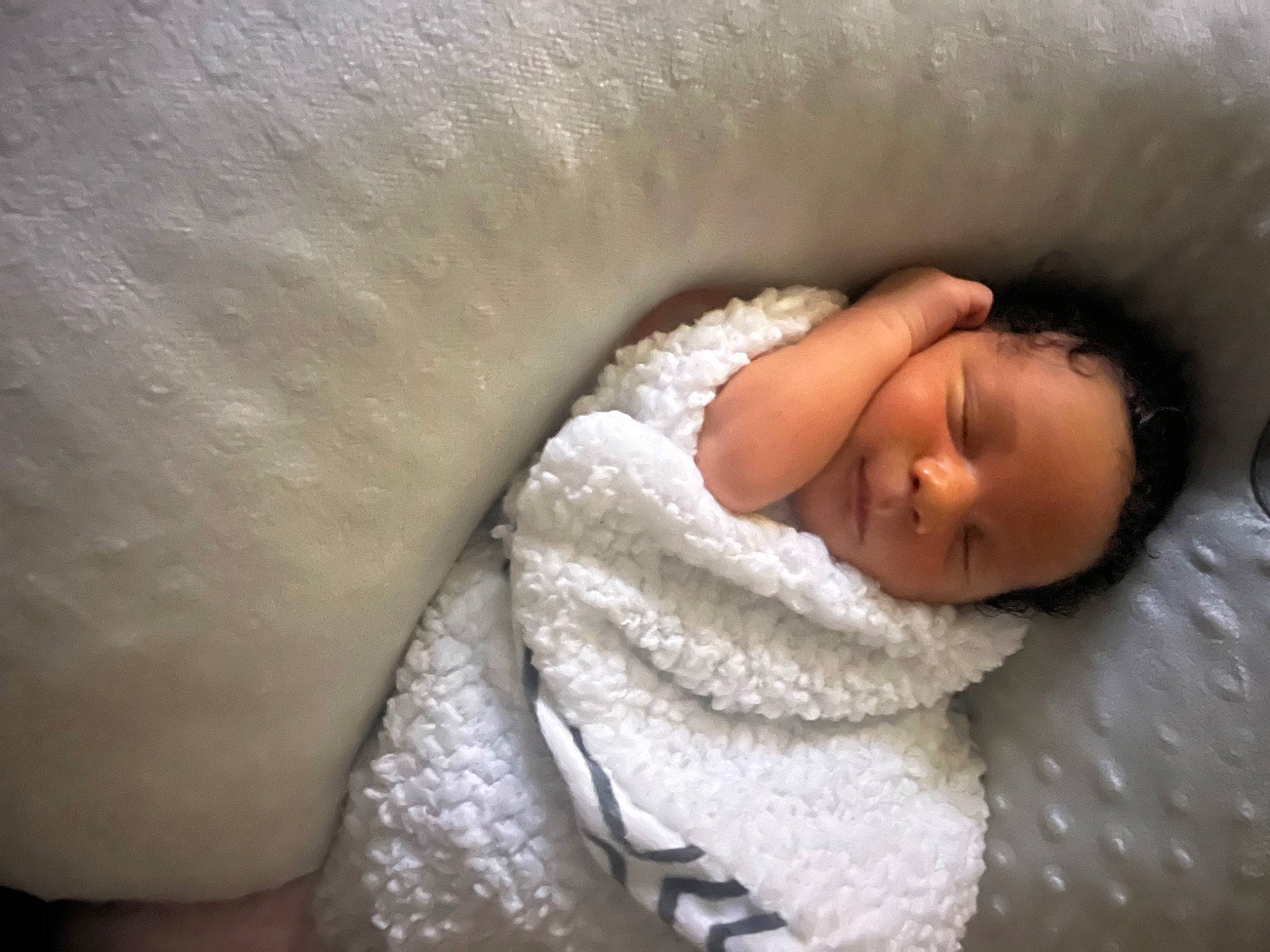 Messiah is registered to the contest to win money with this photo: baby, baby_products, baby_sleeping, baby_toddler_clothing, bedding, bedtime, cheek, child, chin, comfort, eye, eyebrow, fur, head, human_body, linens, nap, nose, person, skin
