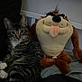 Ninja joined the competition — help win amazing prizes! tabby_cat, cat, stuffed_toy, plush, bed, striped, white_paws, fur, animal, pet, indoor, cute, resting, feline, toy, character, bedroom, soft, playful, companion