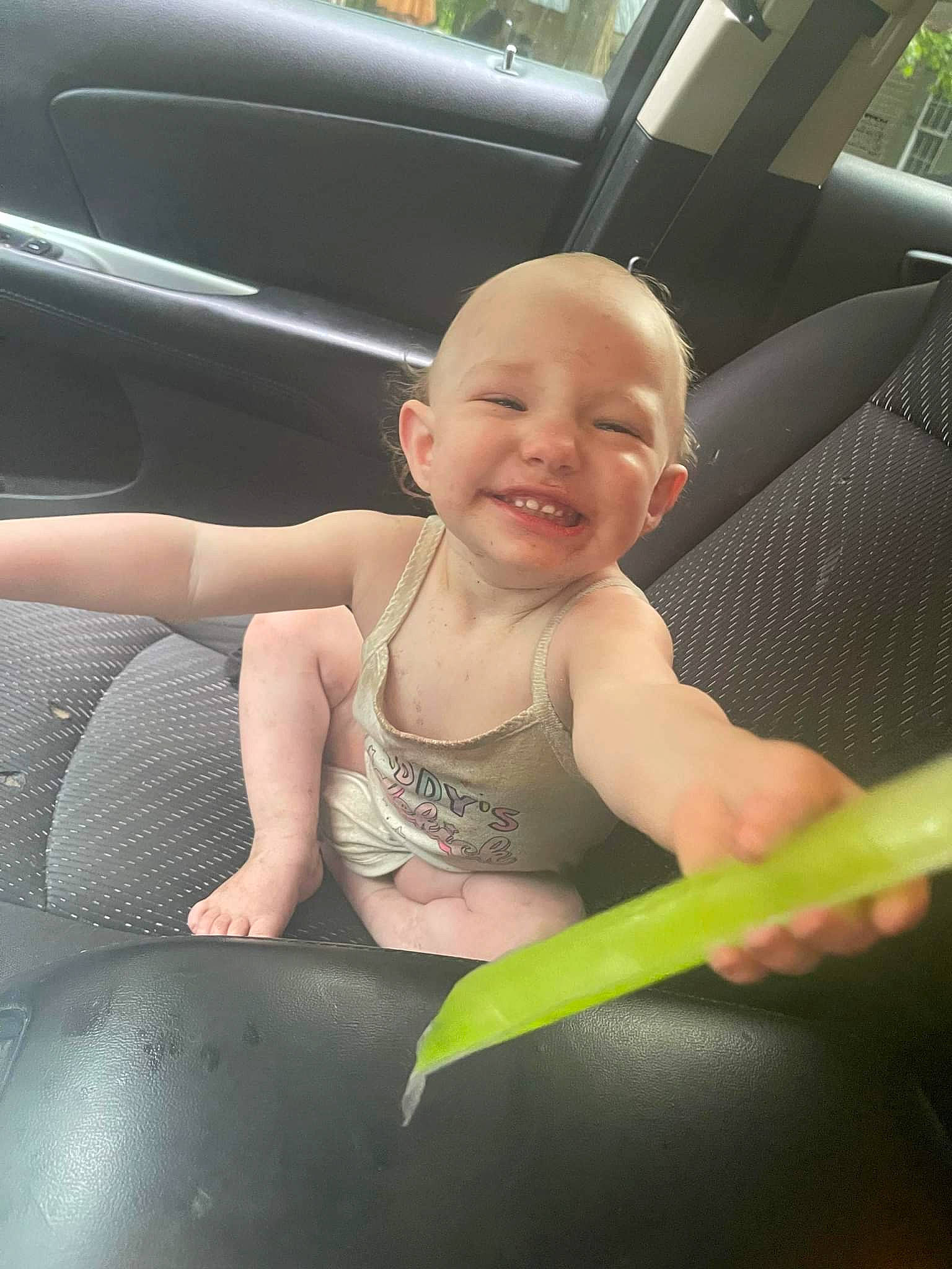 Hazel joined the competition — help win amazing prizes! auto_part, automotive_design, automotive_exterior, car, chest, face, finger, fun, hand, happy, joy, leg, motor_vehicle, person, skin, smile, summer, thigh, thumb, toddler