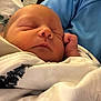 Archer joined the competition — help win amazing prizes! newborn, baby, sleeping, blanket, swaddled, infant, face, hand, soft, cute, resting, peaceful, cozy, closeup, person, human, skin, indoors, comfort, tender