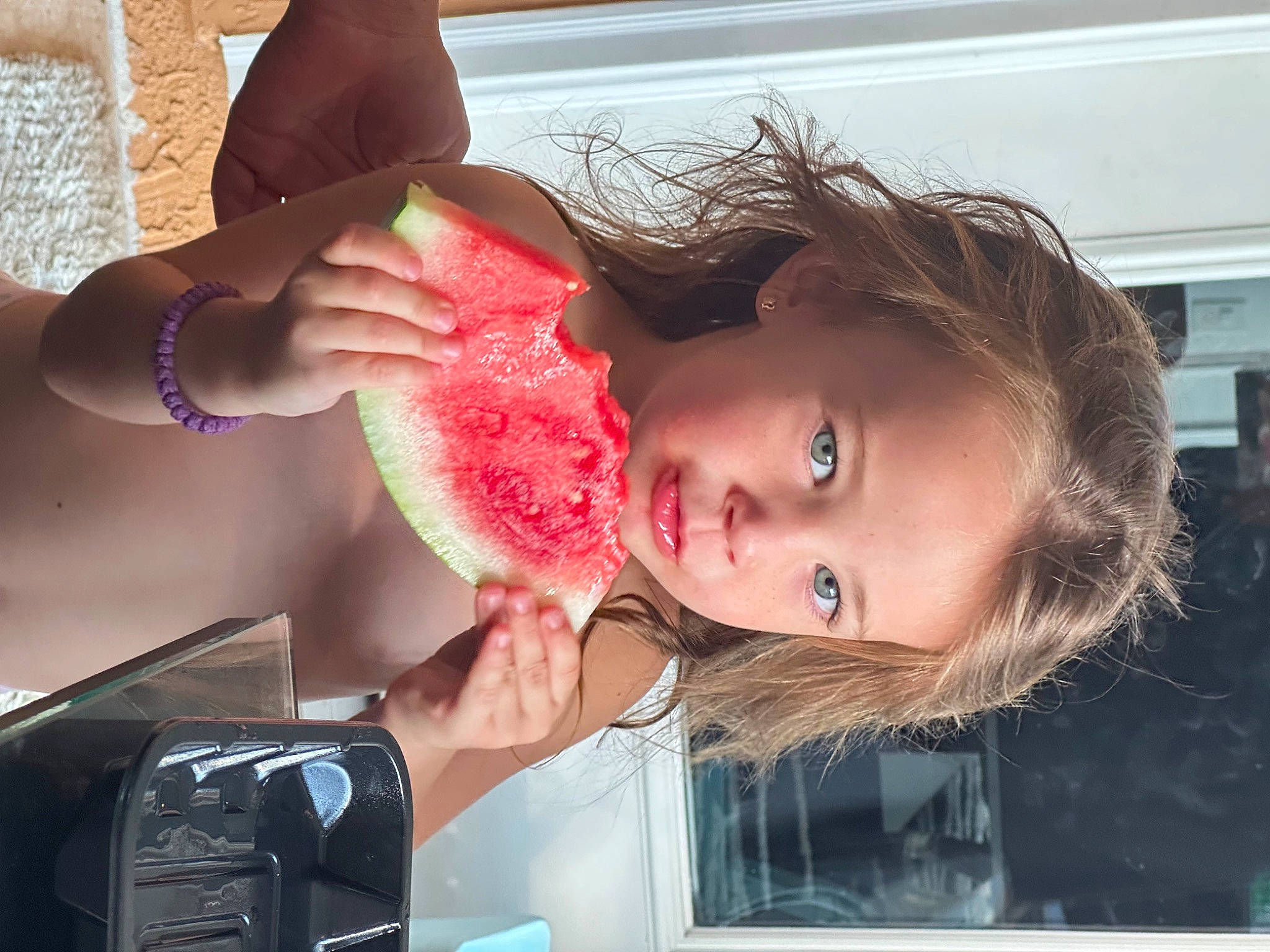 Adela is registered to the contest to win money with this photo: carmine, cheek, child, eyelash, fashion_accessory, flesh, fun, gesture, hair_accessory, hair_coloring, happy, jaw, lip, magenta, mobile_phone, nail, neck, peach, person, throat