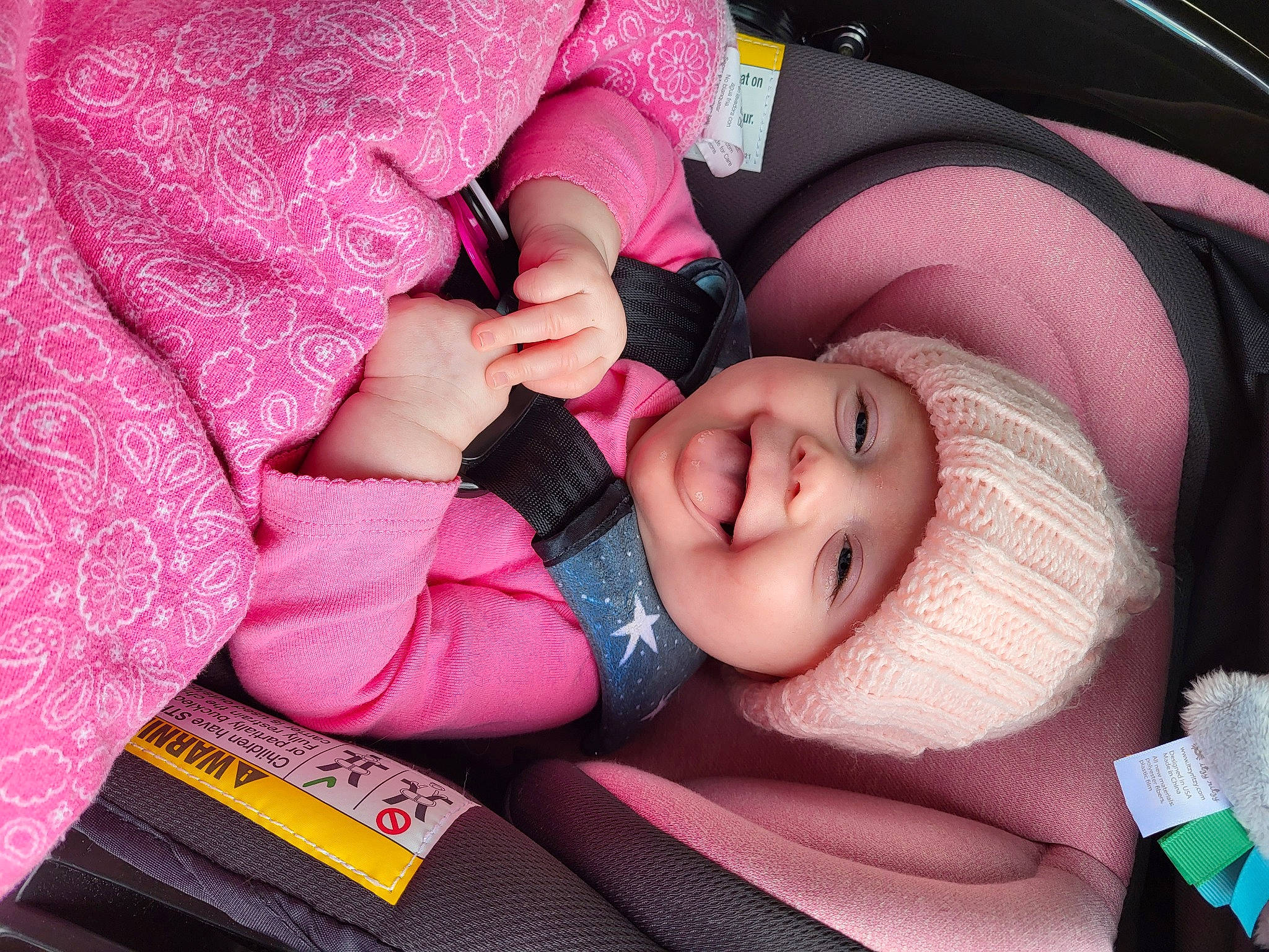 Larissa joined the competition — help win amazing prizes! baby, baby_carriage, baby_toddler_clothing, cheek, comfort, eye, eyebrow, facial_expression, finger, gesture, hand, headwear, human_body, lip, mouth, person, pink, plant, skin, smile