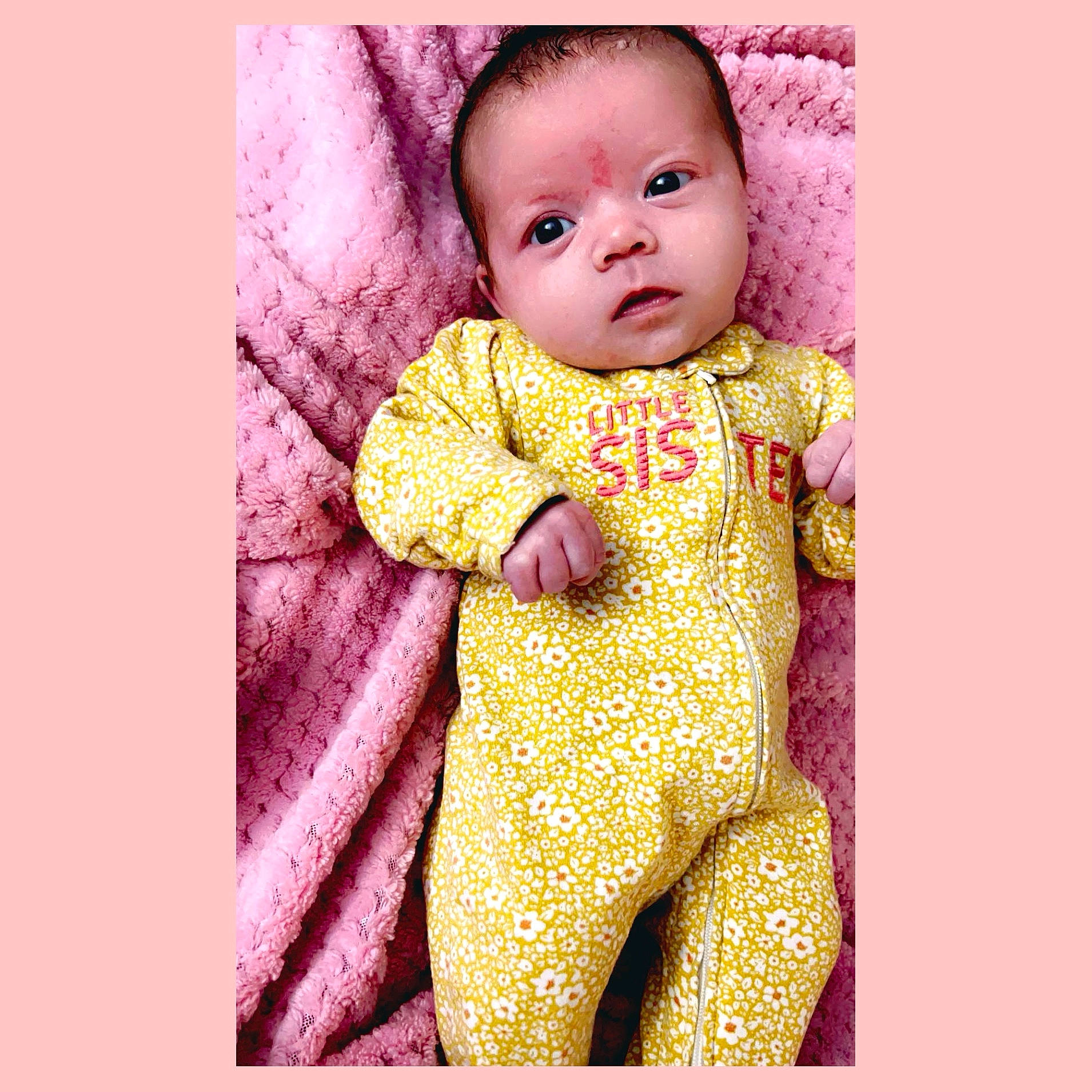 Cambree is registered to the contest to win money with this photo: arm, baby, baby_toddler_clothing, collar, eye, face, happy, human_body, linens, magenta, neck, outerwear, pattern, person, pink, purple, sleeve, smile, toddler, violet