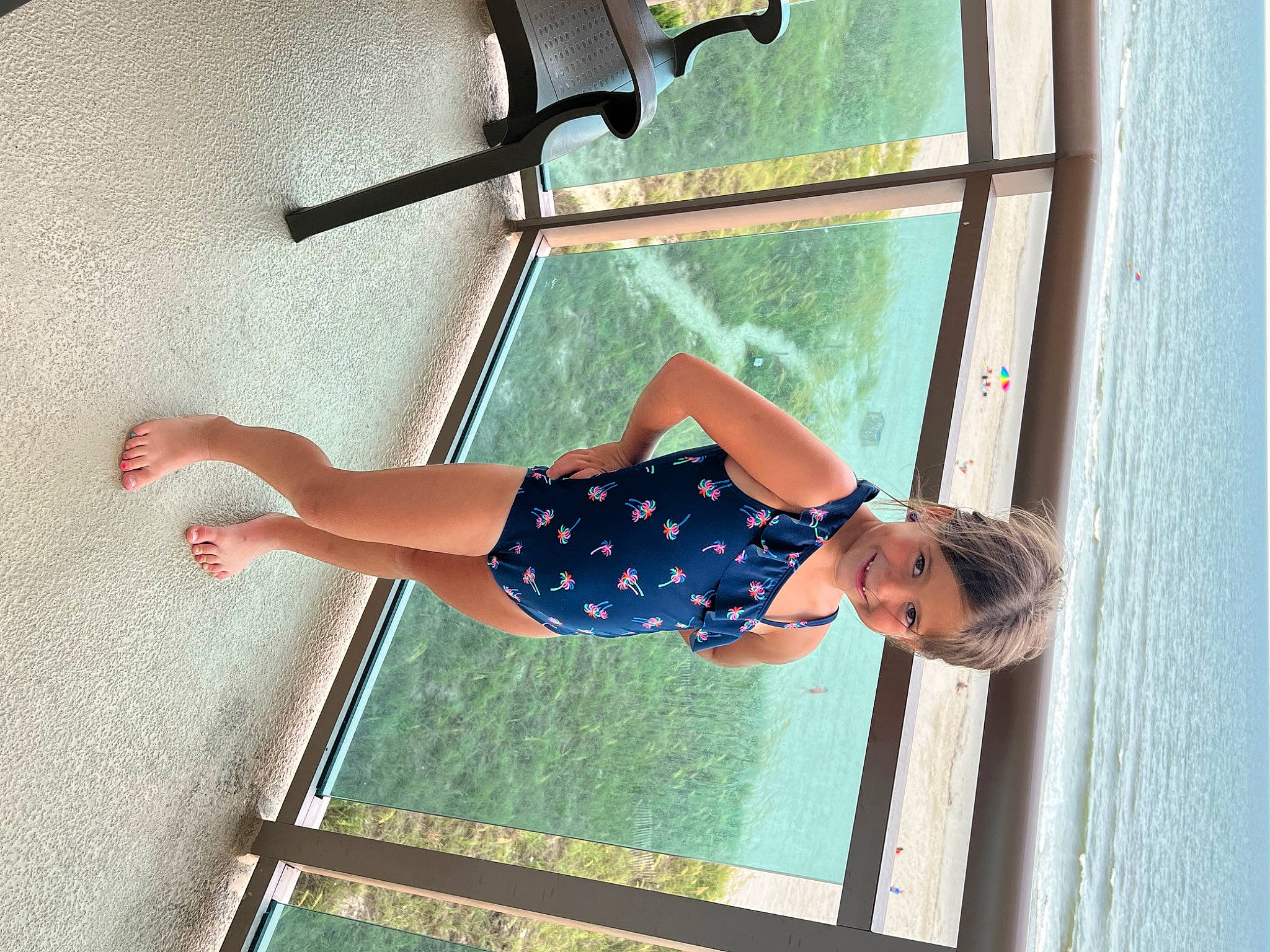 Nataleigh is registered to the contest to win money with this photo: arm, balance, calf, chest, elbow, electric_blue, foot, fun, green, human_leg, joy, knee, leg, leisure, line, pattern, person, recreation, shorts, thigh