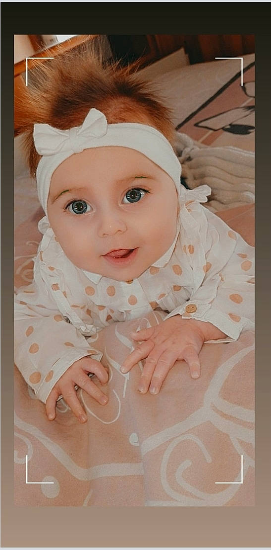 Shelby participe au concours pour gagner de l'argent avec cette photo : baby, cheek, child, eye, eyelash, face, forehead, hair_accessory, head, headband, headgear, headpiece, headwear, lip, person, pink, portrait, skin, toddler