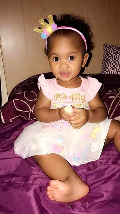 Zayli is registered to the contest to win money with this photo: baby, baby_toddler_clothing, cheek, child, clothing, eyelash, face, fun, happy, headband, headpiece, iris, jewellery, magenta, person, pink, purple, skin, thigh, toddler