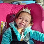 toddler, child, car_seat, crown, headband, smile, sunlight, shadow, jacket, seatbelt, car_interior, happy, cute, portrait, baby, clothing, seat, safety, vehicle, daylight