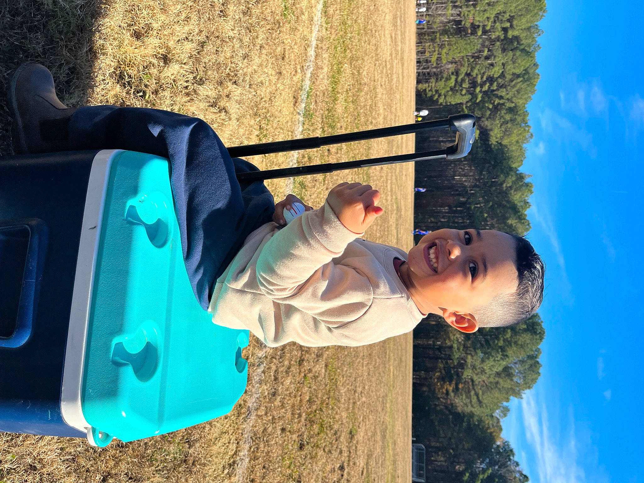 Dereck joined the competition — help win amazing prizes! auto_part, automotive_exterior, automotive_lighting, blue, bumper, car, electric_blue, fun, grass, happy, joy, landscape, leisure, motor_vehicle, people_in_nature, person, recreation, sky, travel, tree