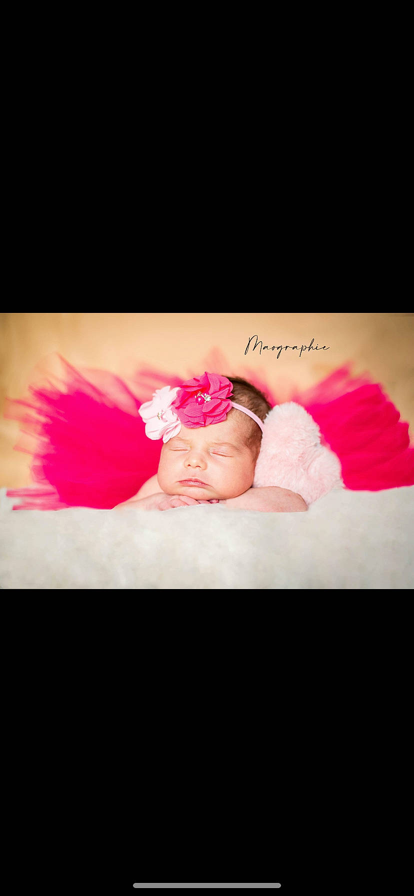 Mya participe au concours pour gagner de l'argent avec cette photo : arm, baby, baby_sleeping, baby_toddler_clothing, comfort, eyelash, finger, font, hair_accessory, hand, headband, headgear, headpiece, headwear, human_body, linens, lip, magenta, person, petal