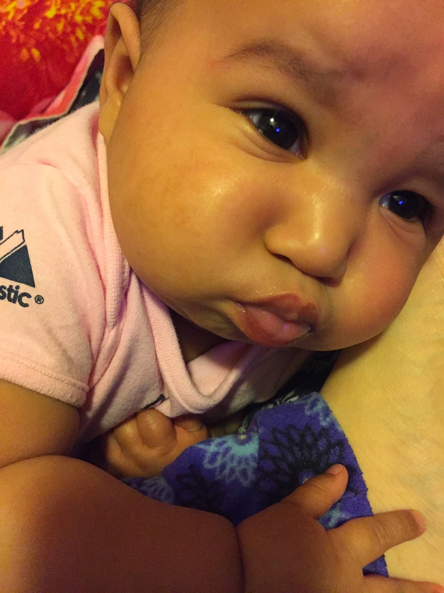 Alaska is registered to the contest to win money with this photo: abdomen, baby, beauty, cheek, child, close_up, eye, eyebrow, face, finger, hand, head, lip, mouth, muscle, nose, person, skin, smile, thumb