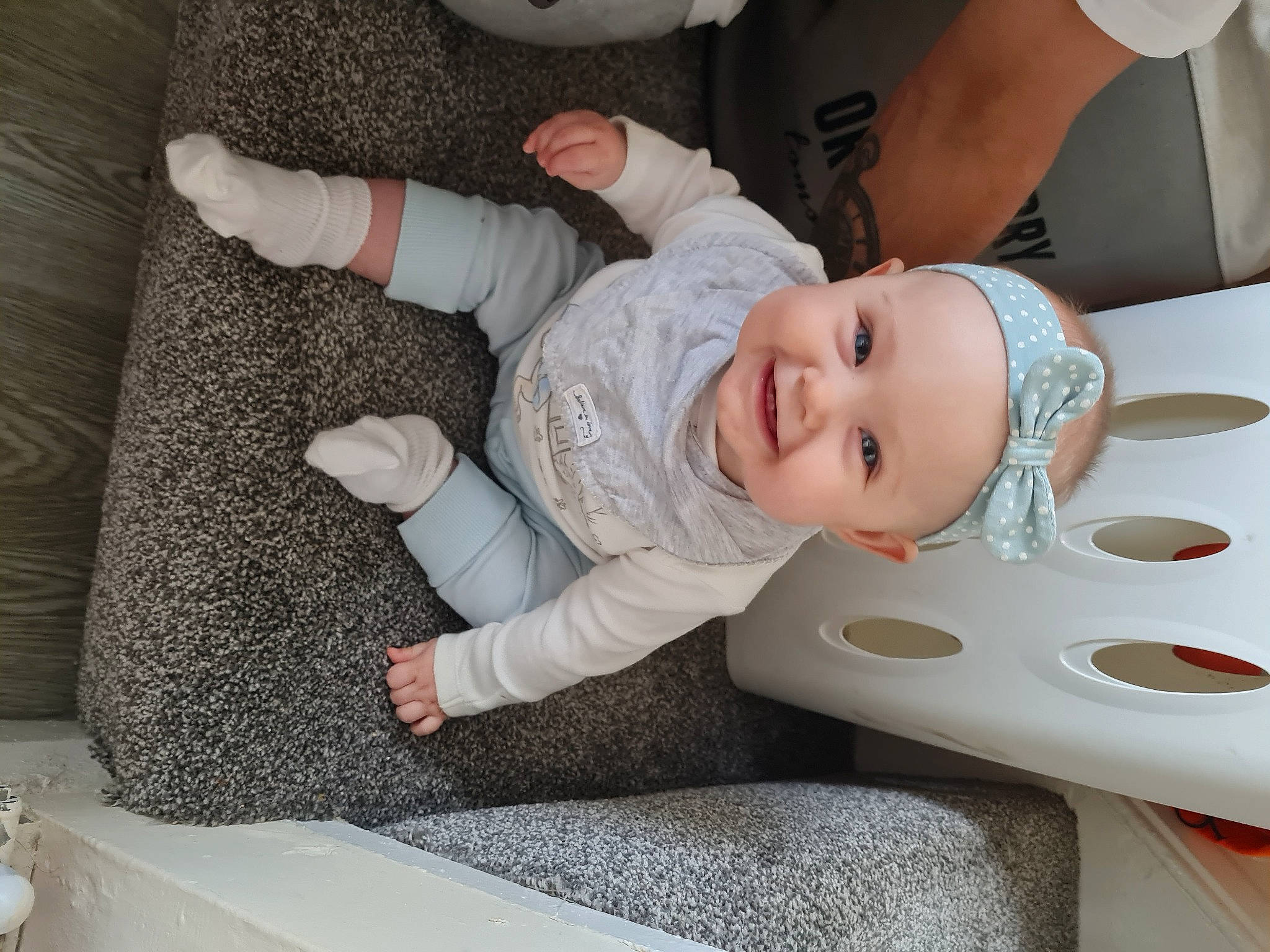 Constance joined the competition — help win amazing prizes! baby, baby_laughing, baby_products, baby_safety, baby_toddler_clothing, child, comfort, flooring, hat, headwear, joy, linens, person, product, room, sitting, sleeve, smile, textile, toddler