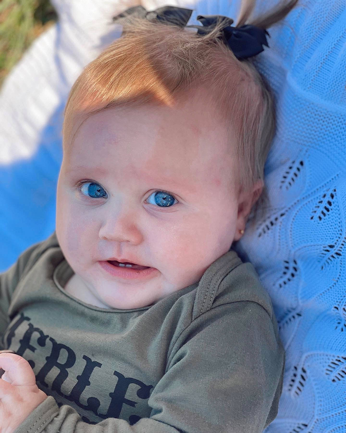 Karsyn joined the competition — help win amazing prizes! azure, baby, baby_toddler_clothing, cheek, chin, cool, ear, eye, eyebrow, eyelash, grass, hairstyle, happy, head, iris, lip, person, skin, sleeve, toddler