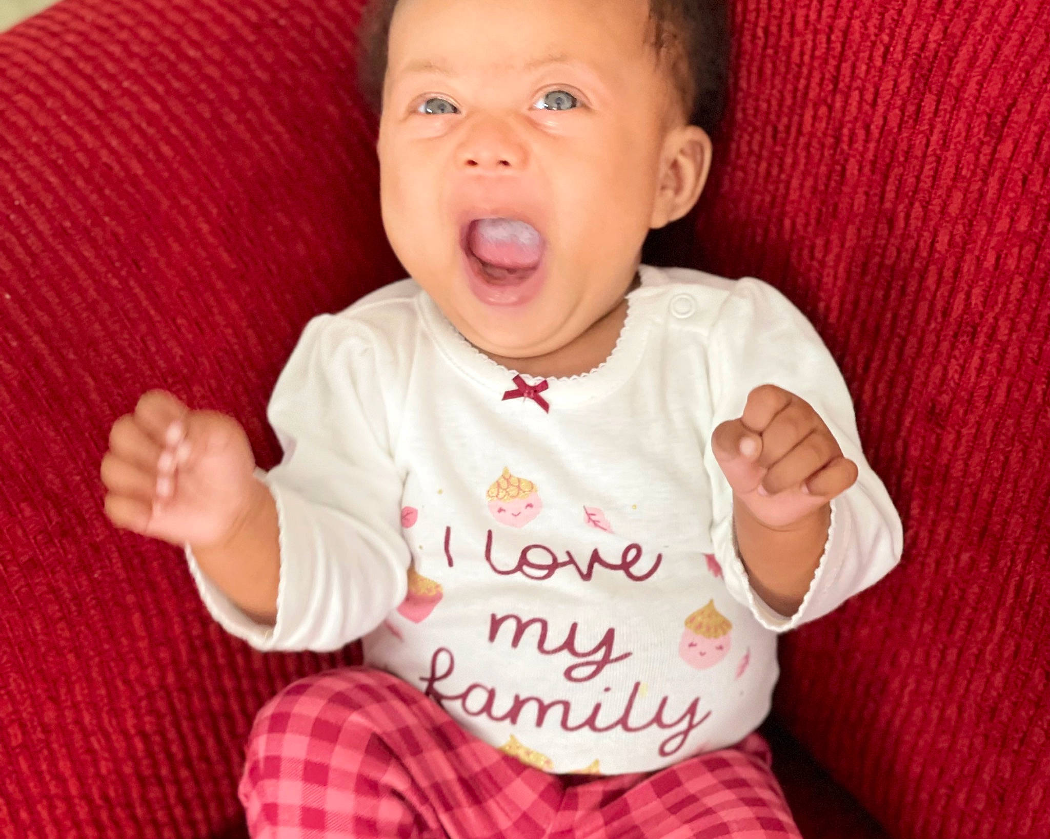 Abiona joined the competition — help win amazing prizes! baby, baby_toddler_clothing, cheek, child, chin, comfort, eye, finger, gesture, happy, lip, mouth, nose, person, pink, skin, sleeve, tartan, textile, thumb