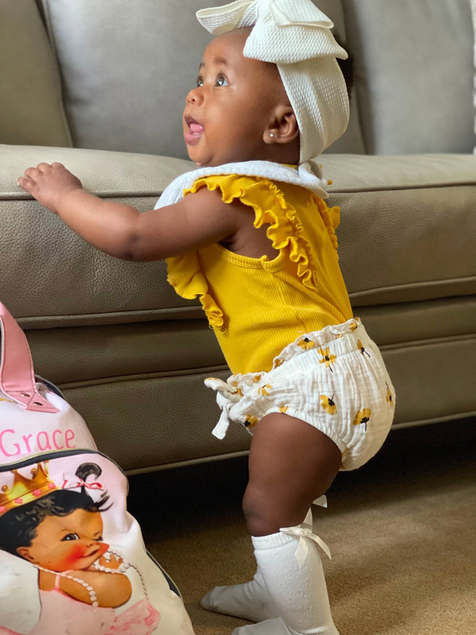 Abiona joined the competition — help win amazing prizes! baby, baby_toddler_clothing, cap, car_seat, child, couch, finger, happy, headwear, human_leg, knee, person, skin, snapshot, sock, surprise, t_shirt, textile, thigh, toddler