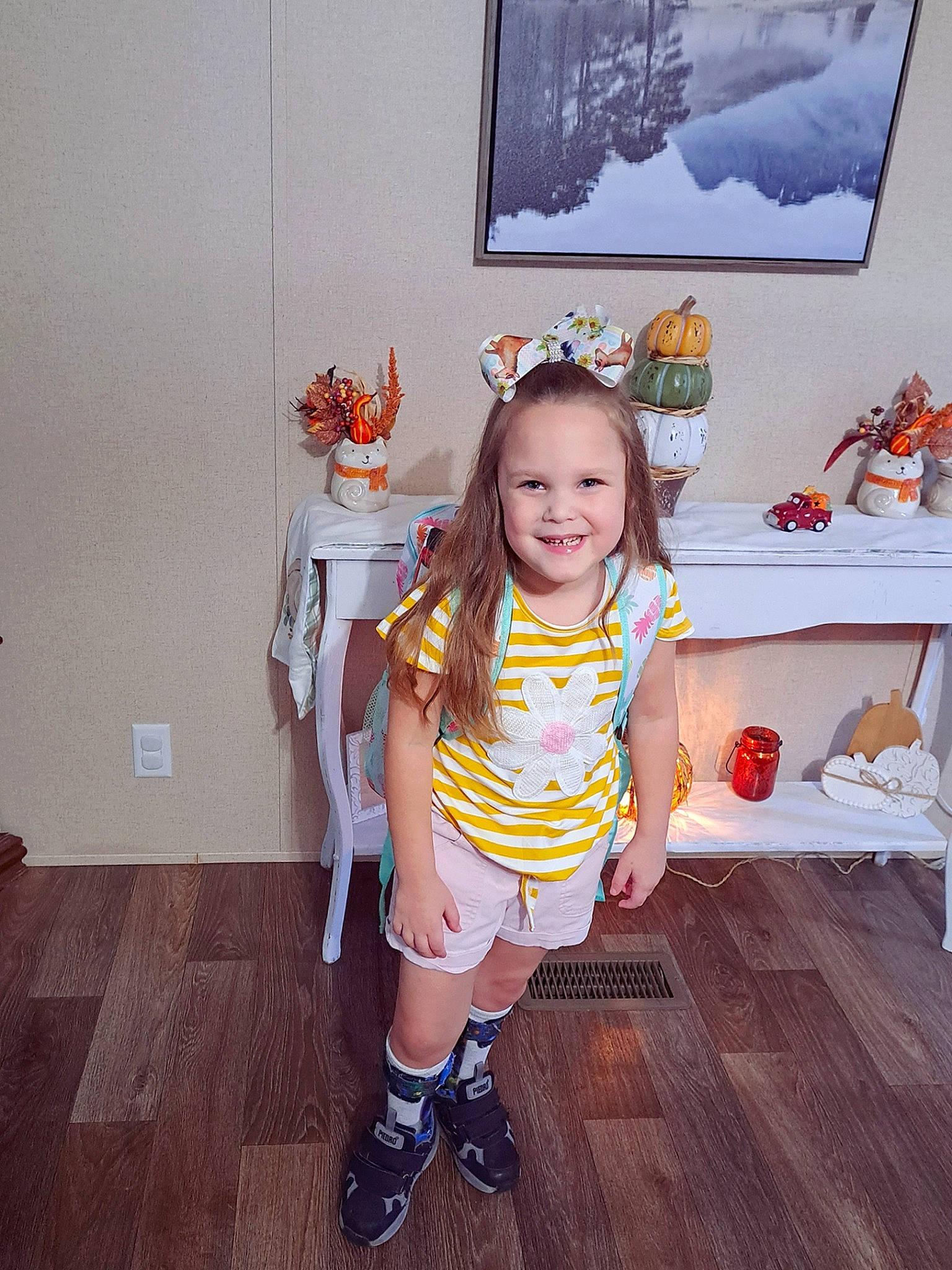 Delilah joined the competition — help win amazing prizes! art, baby_toddler_clothing, child, fashion_design, flooring, fun, happy, hardwood, human_leg, joy, leg, paint, pattern, peach, person, picture_frame, room, sandal, smile, sock