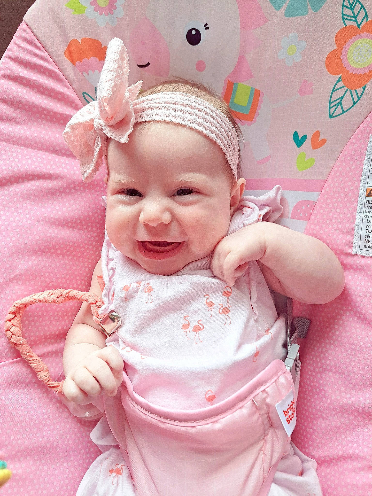 Maddie is registered to the contest to win money with this photo: baby, baby_products, baby_toddler_clothing, cap, cheek, child, costume_hat, eye, happy, headband, headpiece, human_body, magenta, pattern, person, pink, skin, sleeve, smile, textile