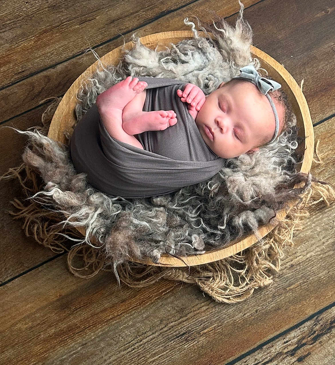 Amariah-Mae is registered to the contest to win money with this photo: baby, newborn, sleeping, swaddle, bow, wooden, wool, fur, headband, peaceful, infant, cute, cozy, indoor, portrait, tiny, wrapped, foot, hand, soft